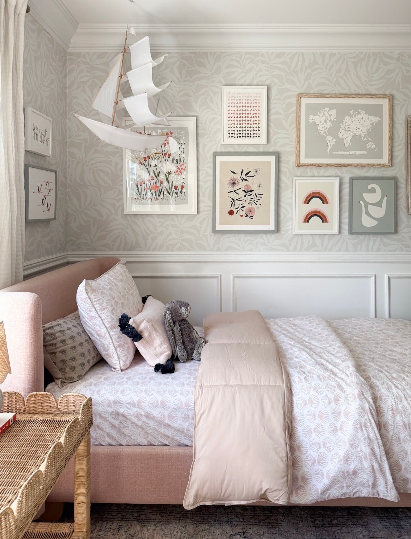 Girl’s modern coastal bedroom, gallery wall, cozy bedding, woven scalloped side table and cozy rug

#LTKKids #LTKBaby #LTKmomlife