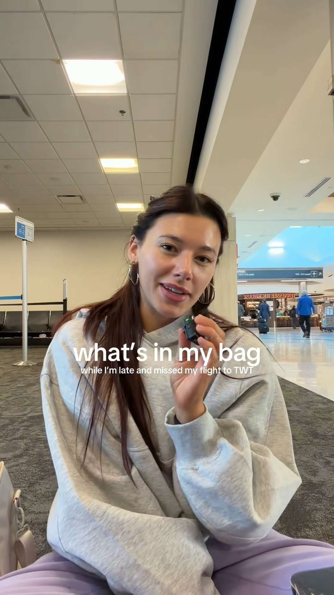 what's in my bag 🤍 as i wait for my missed flight for trippin with tarte! 

 #LTKgrwm #LTKootd #LTKTravel