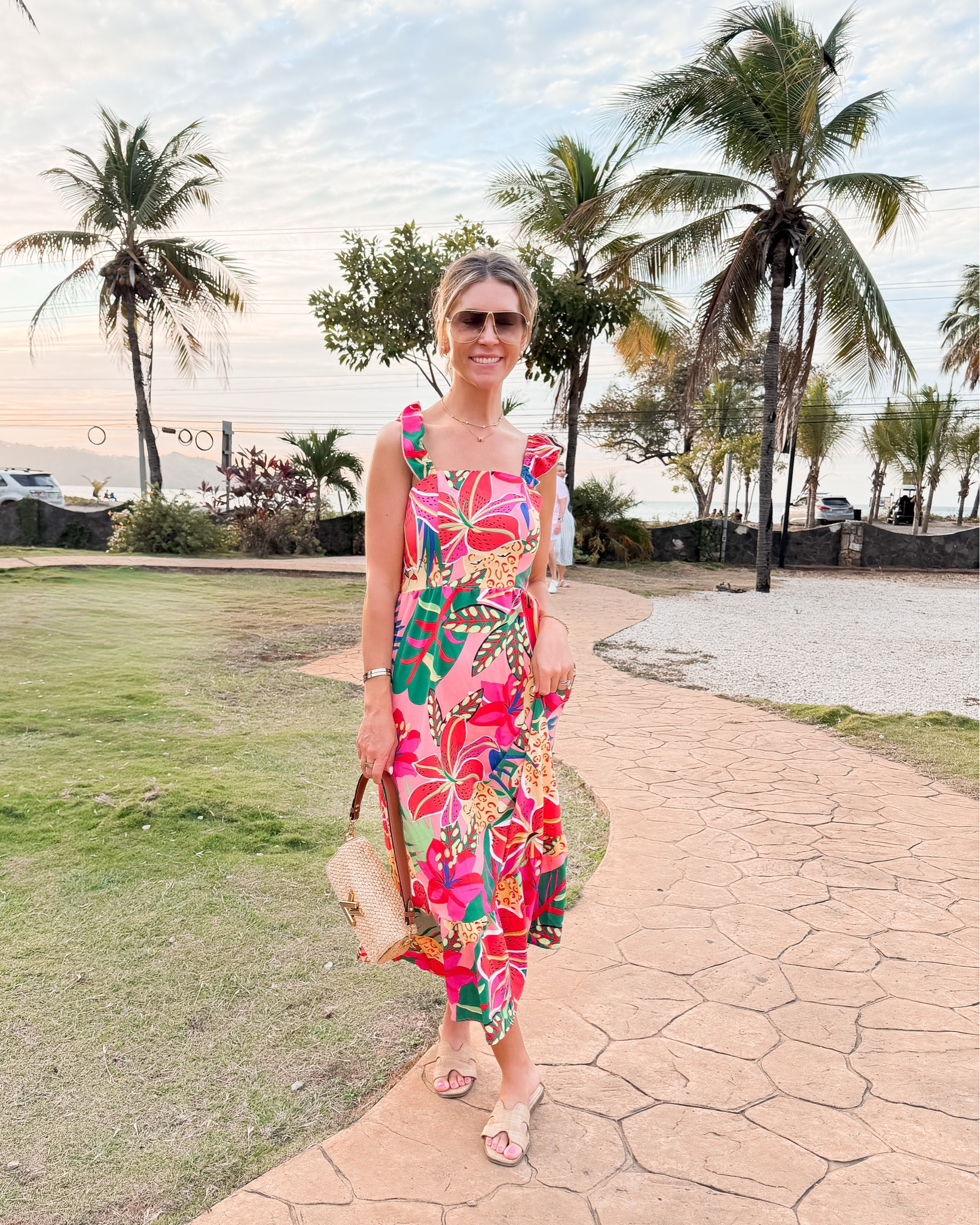Costa Rica ☀️ 
Wore this cute little tropical Amazon dress for dinner! Size small 
Raffia sandals 
Raffia purse 
Miu miu sunglasses 

#LTKOver40 #LTKootd #LTKTravel