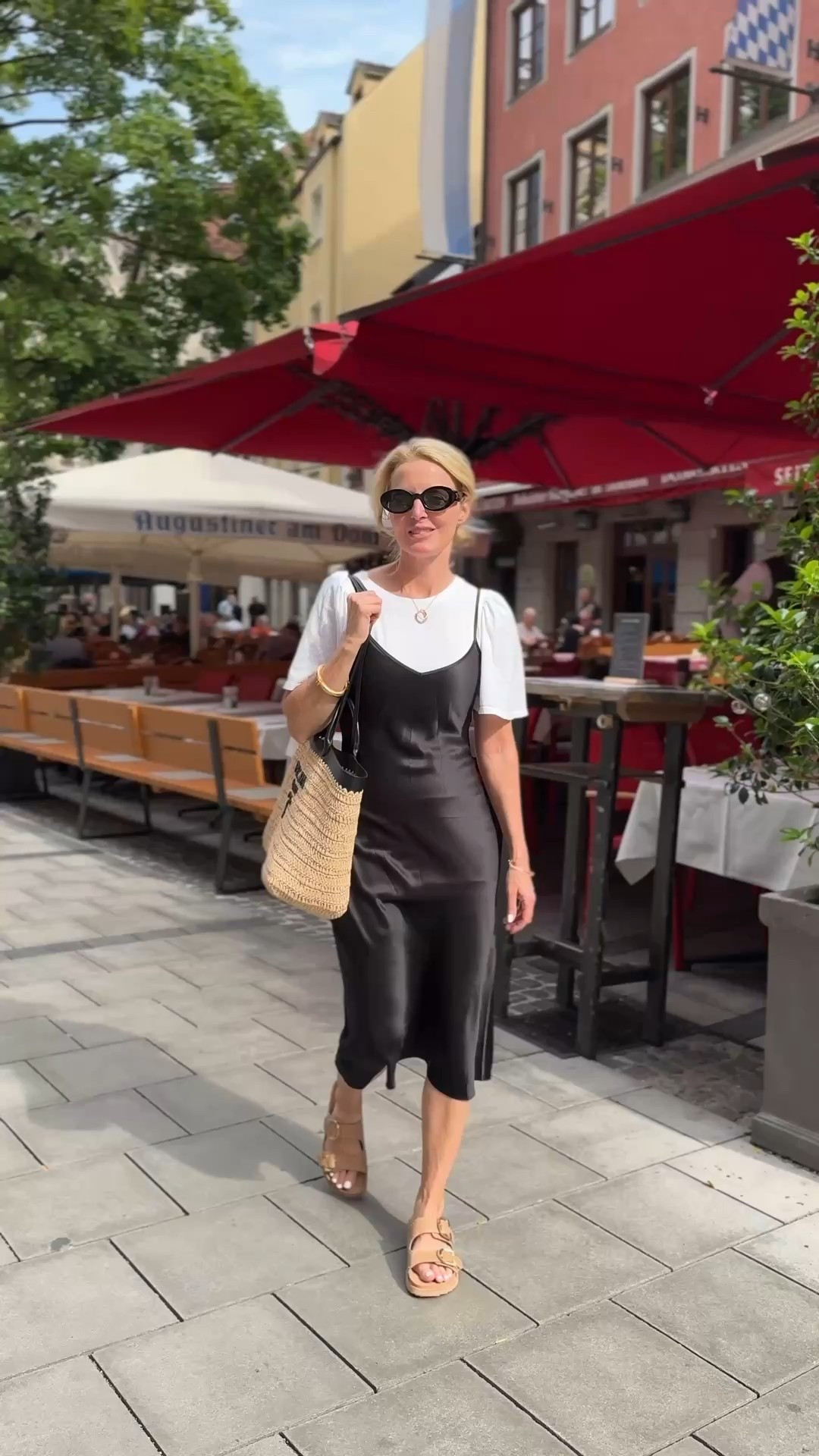 What I wore in Munich, Germany to sightsee around the Marienplatz 🖤

For a more casual daytime look, I layered my Quince black silk midi dress over a white tee and paired it with some supportive sandal slides. This dress also doubles as an amazing option for dinners and nicer events. 

TIP: Wear a fitted skirt slip over the top of your tee so that it stays smooth under your skirt! 

~Erin xo 

#LTKTravel #LTKStyleTip #LTKSeasonal