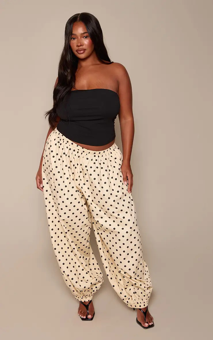 PrettyLittleThing Plus ButterCream Polka Dot Balloon Trousers | Boohoo USA | boohoo (US & Canada)