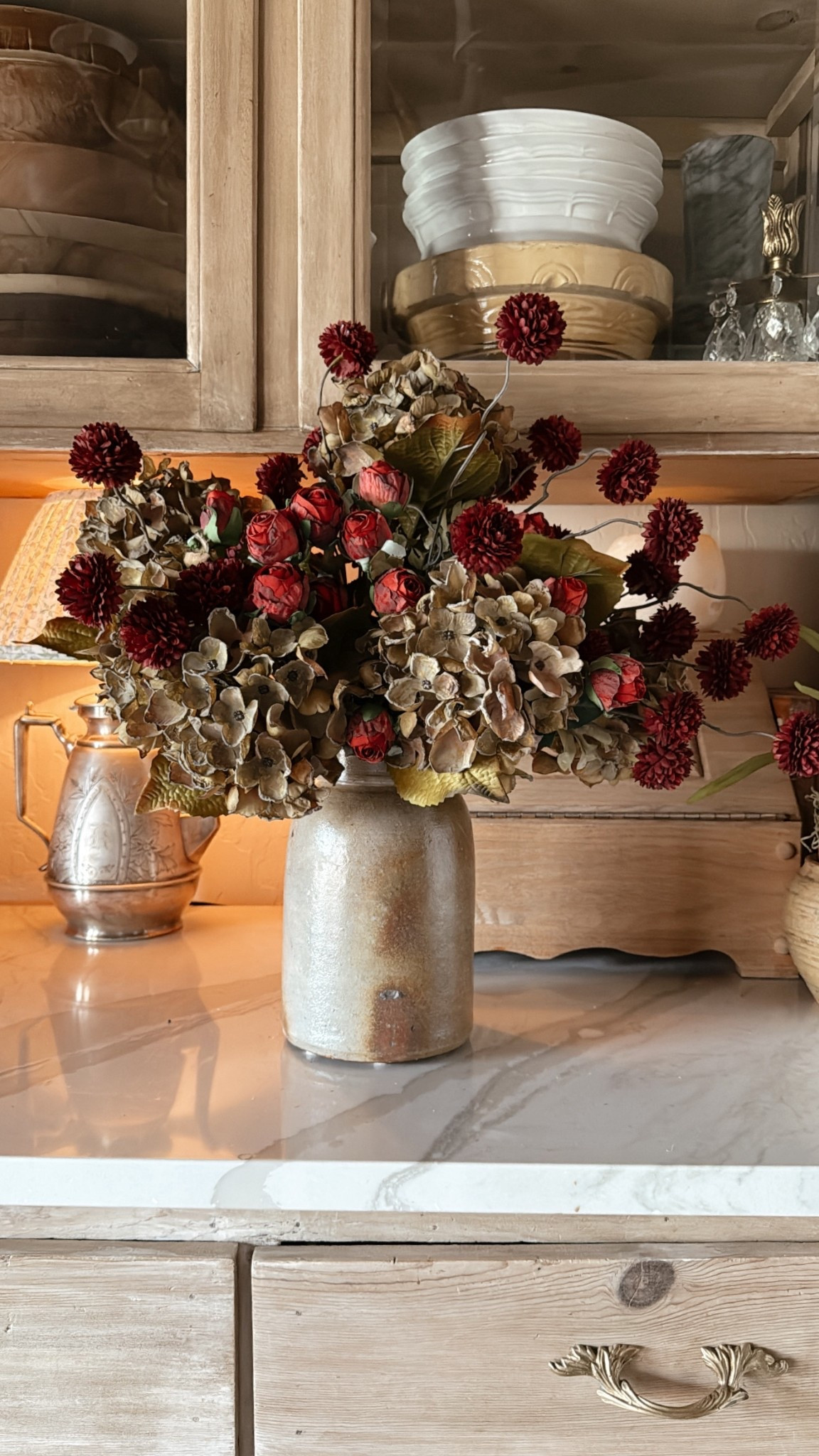 Love this faux floral combo! Green hydrangeas, red roses, and burgundy chrysanthemums 
