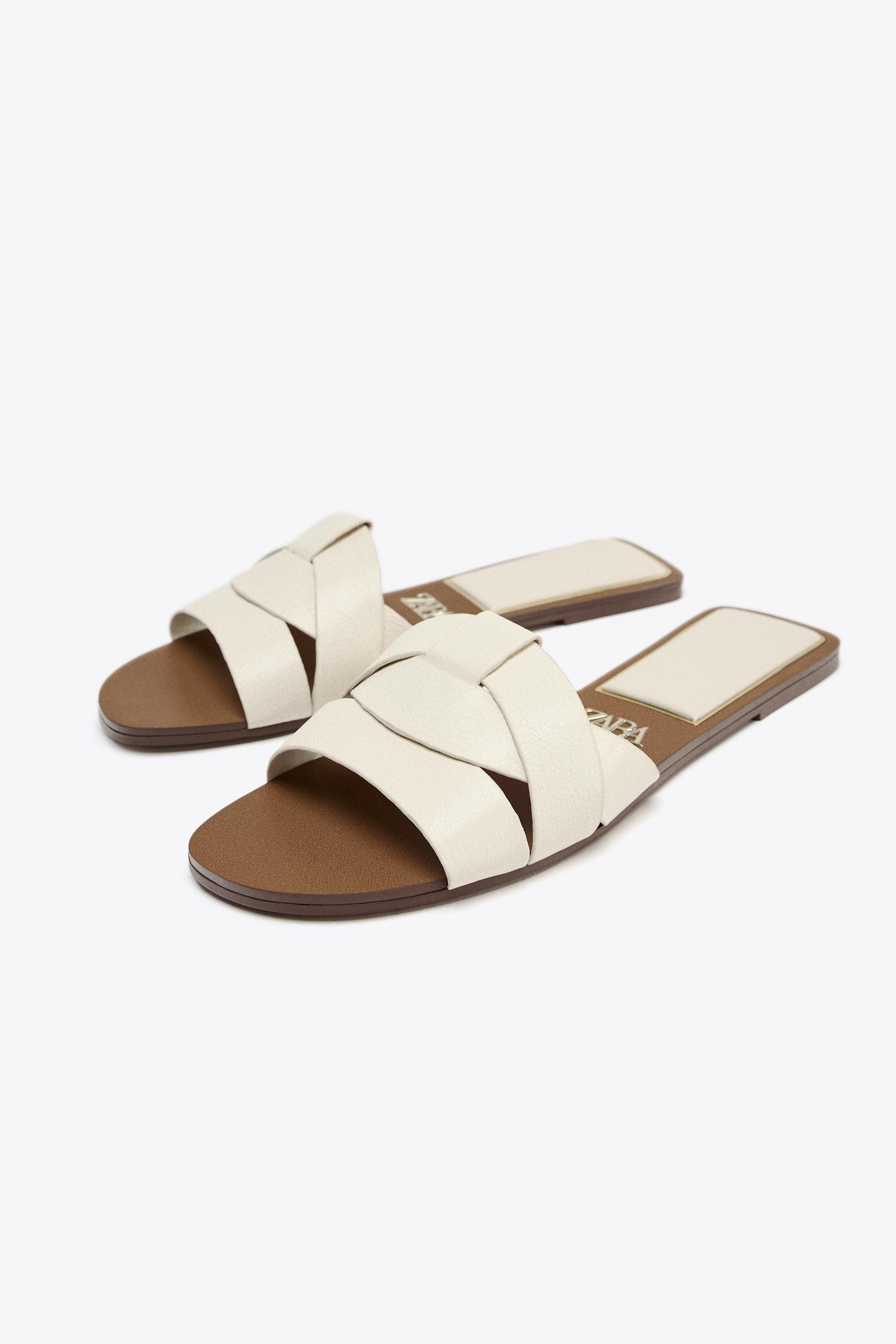 FLAT CROSSED LEATHER SANDALS | Zara US
