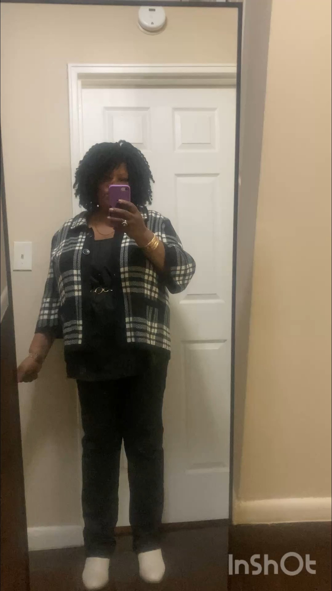 Today I am sharing my OOTD with you. I have on a black and white checkered jacket with a plain black shirt and a gold chain belt. I am wearing plain black pants and beige boots. The jewelry that I am wearing is gold bangle  bracelets, and I am also wearing a gold watch.

#LTKPlusSize #LTKootd #LTKOver40