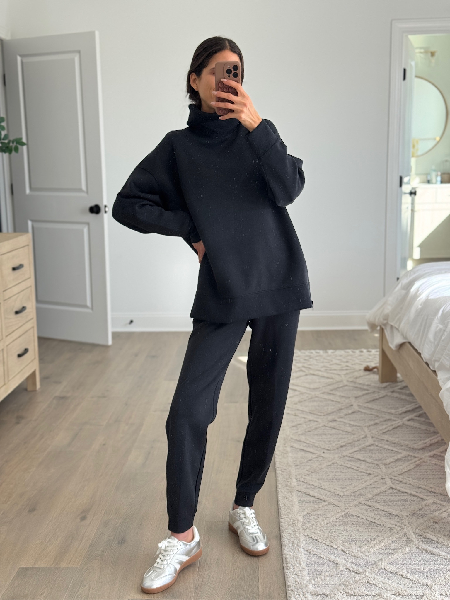 Black matching lounge set with a relaxed, cozy fit that feels polished and comfortable. Oversized sweatshirt paired with joggers and sneakers for an easy everyday athleisure outfit. Perfect for travel days, errands, school drop off, or lounging at home. Black lounge set, matching sweatsuit, women’s athleisure outfit, casual mom outfit, cozy jogger set, everyday casual wear, relaxed fit sweatshirt, comfortable lounge outfit.

#LTKFindsUnder50 #LTKSeasonal #LTKootd