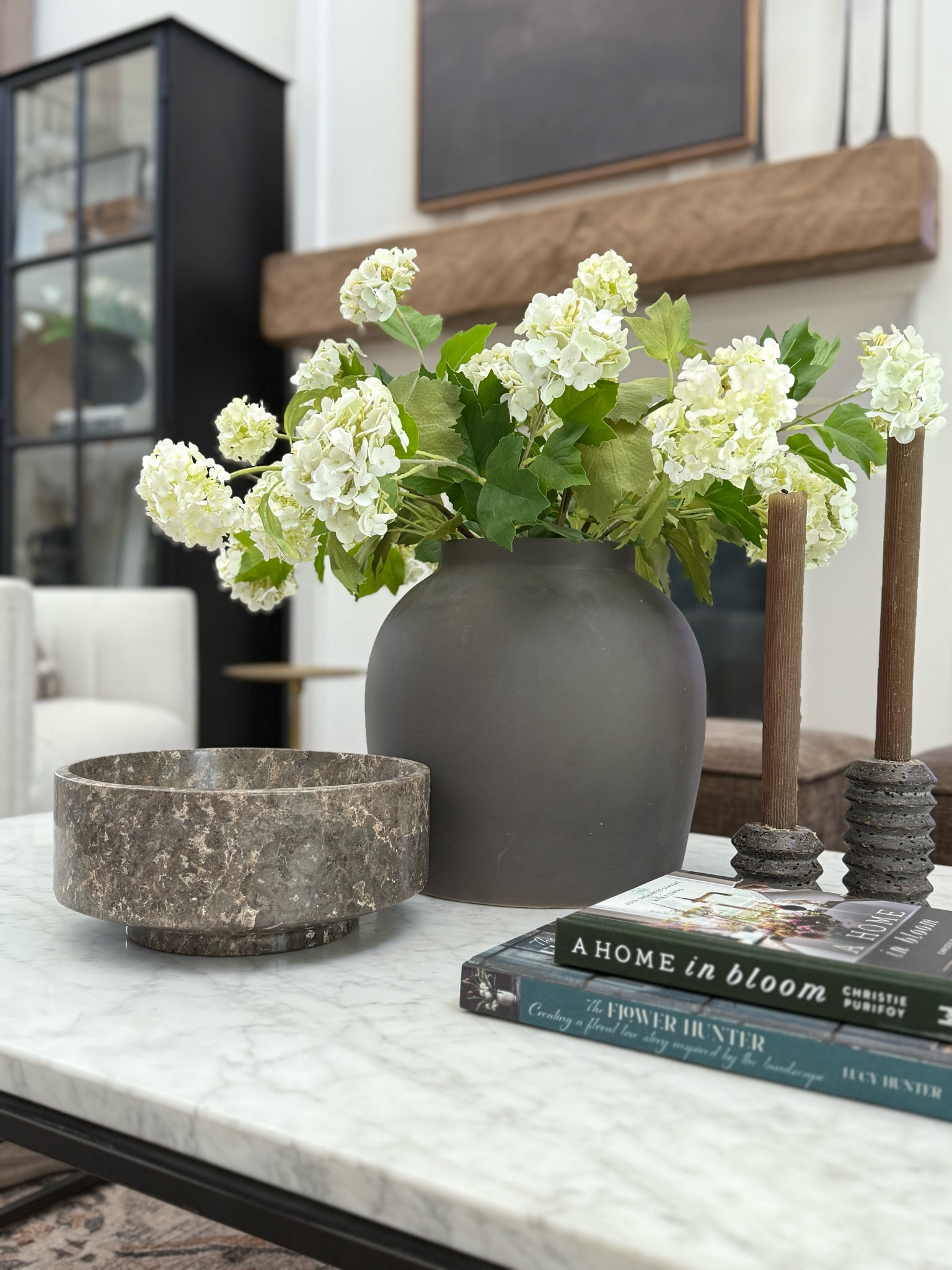 I love faux snowball hydrangeas for springtime 🍃

Faux flowers 
Snowball hydrangeas 
Spring decor 

#LTKFindsUnder50 #LTKFindsUnder100 #LTKHome