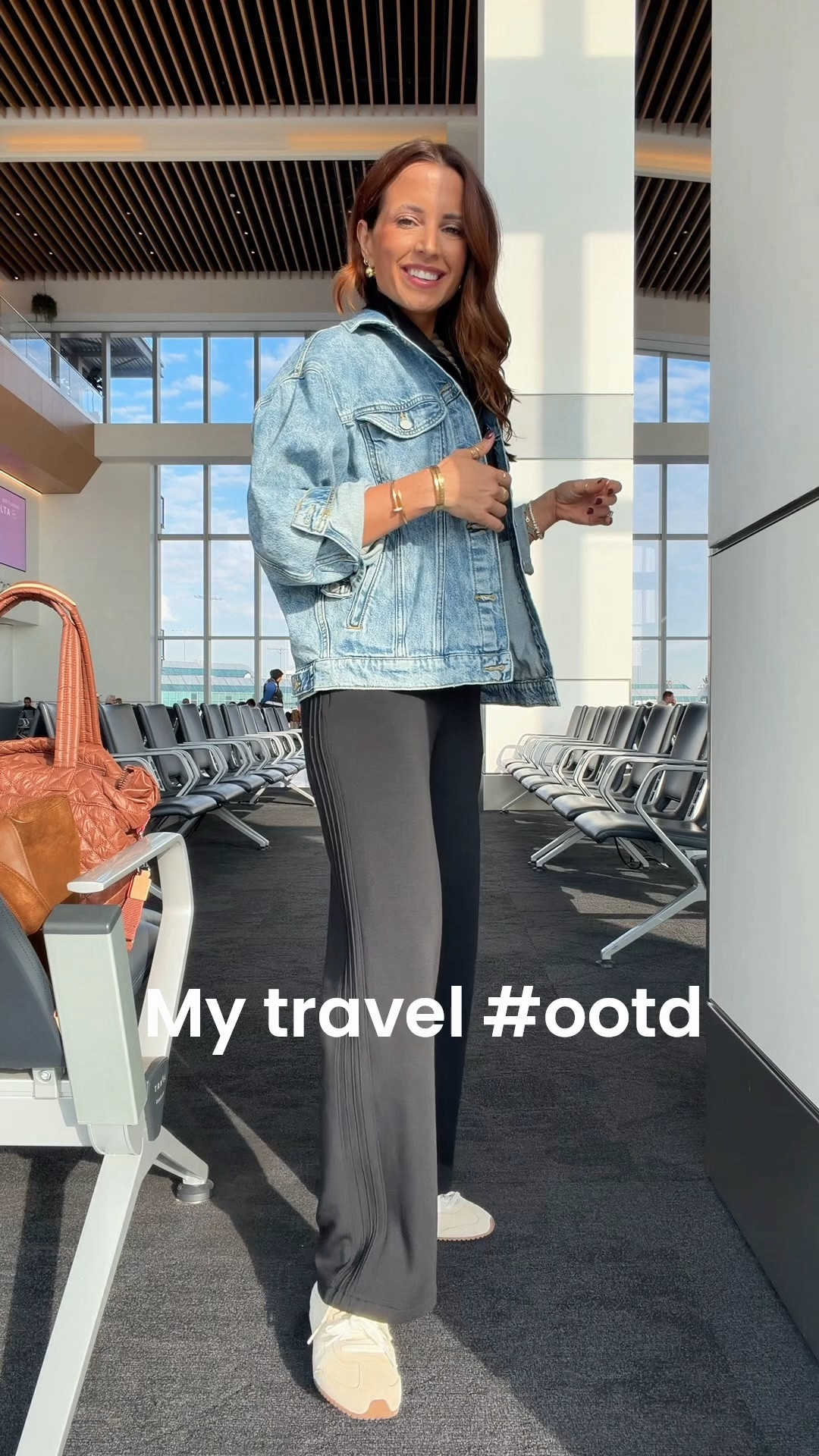 My travel outfit of the day. Airport outfit. Casual outfit. Elevated casual outfit. Spanx jumpsuit (bathroom-friendly) in XS petite. Code LISAMARIEXSPANX on first time purchases. XS in slouchy denim jacket. Alo mule sneakers are TTS. MX Wallace quilted tote bag in medium, color ‘terracotta’.