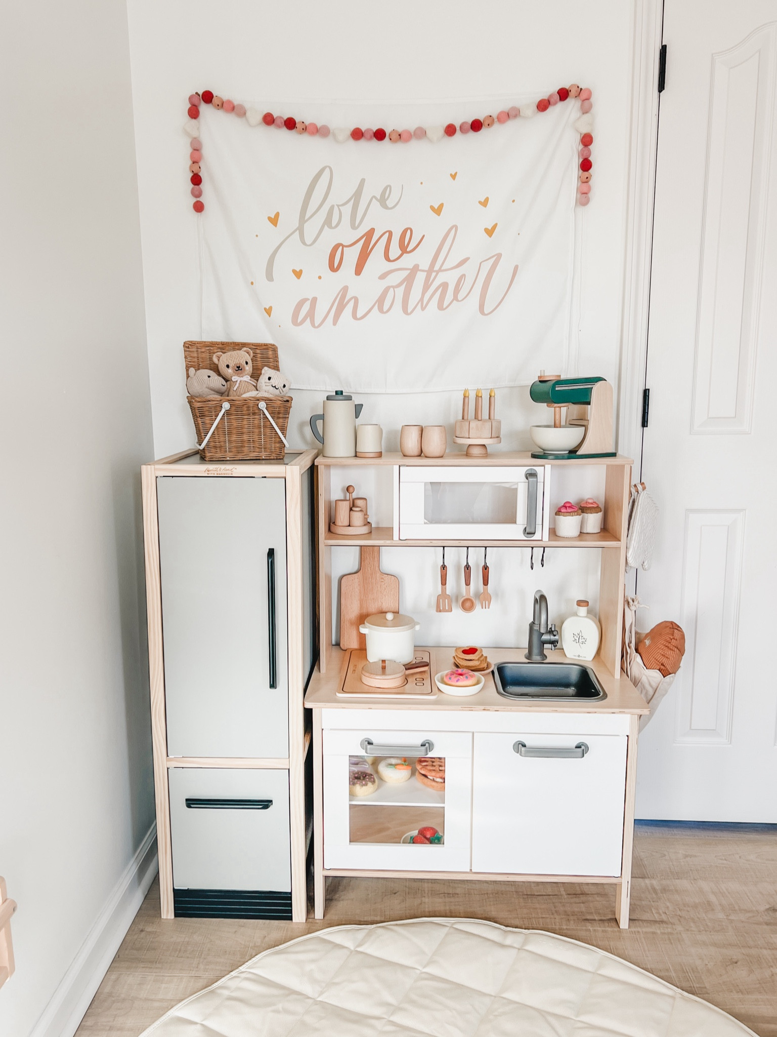 Valentine’s play kitchen with yummy treats! Garland is Little Books and Nooks, quilted play mat is Rylie Pea and Co (both linked on my IG)

#LTKSeasonal #LTKKids #LTKBaby