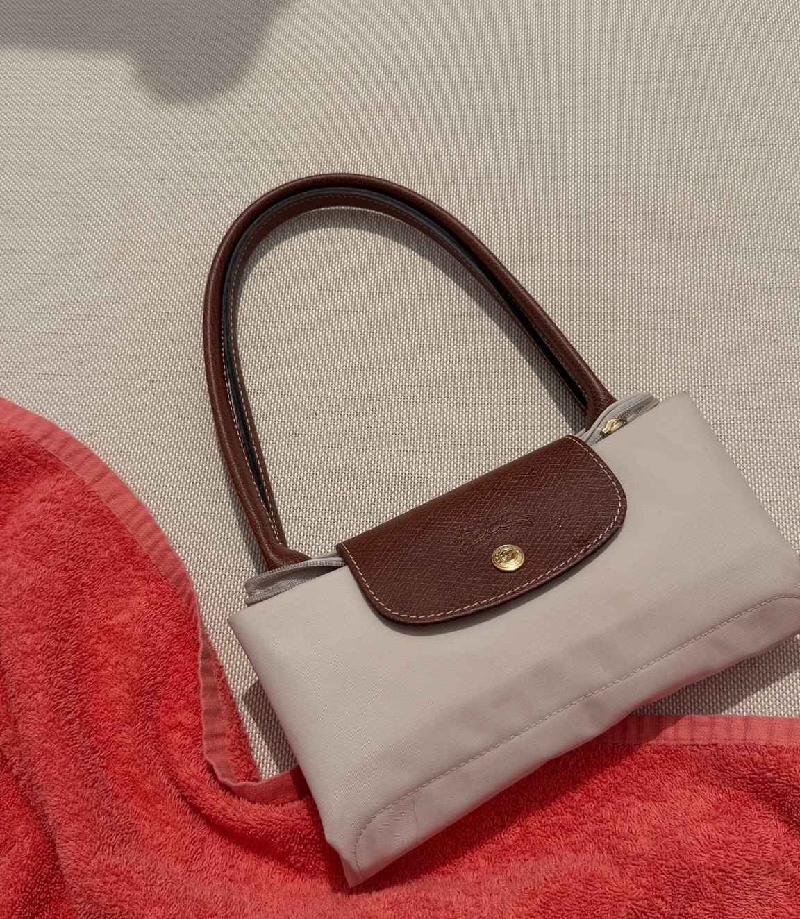 I love this bag for my 10yo. It opens up into a big tote but also can be carried as a mini shoulder bag. It’s nylon so cleaning it is easy!