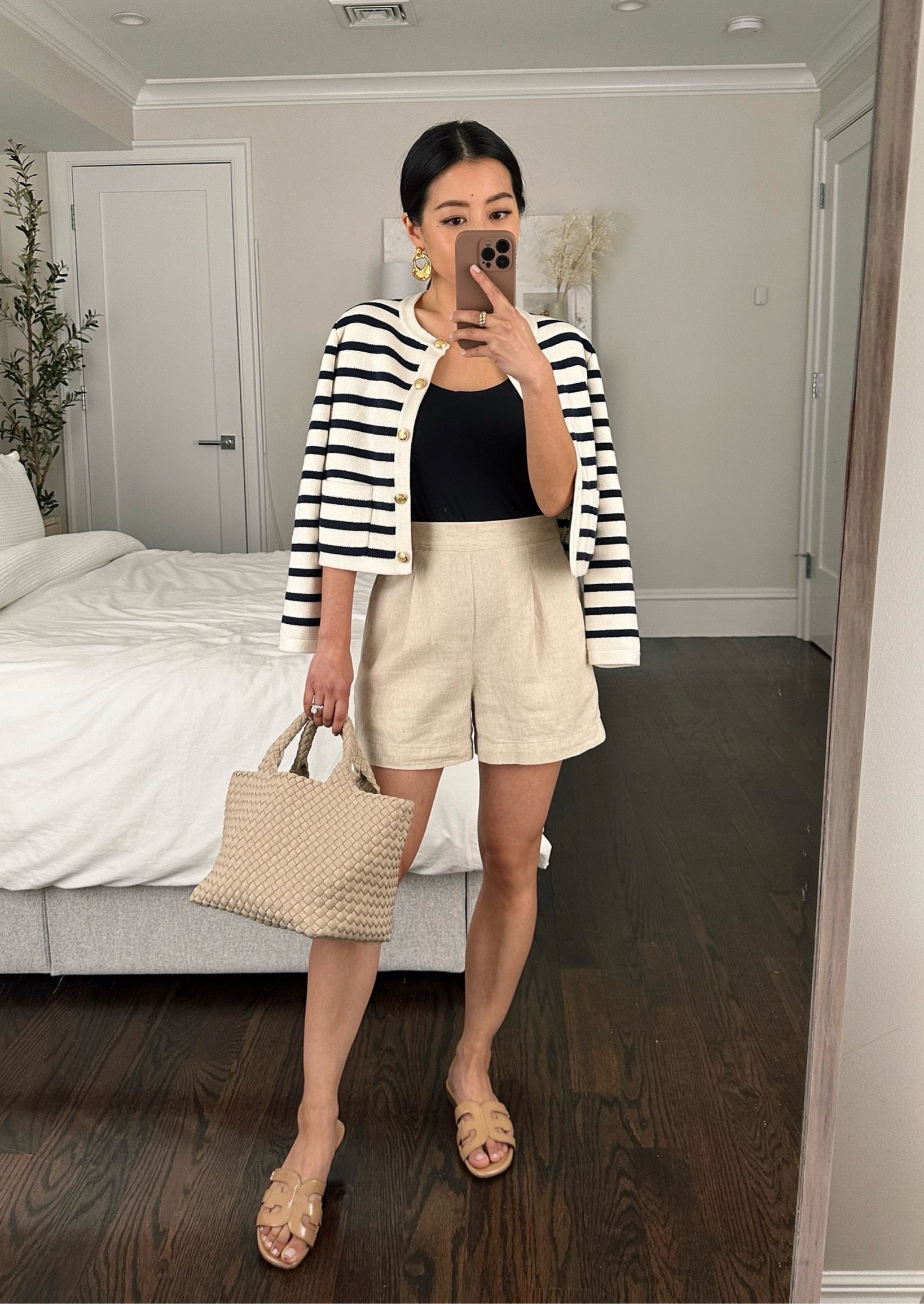 polished casual spring to summer outfit 

•J.Crew Emilie sweater jacket xxs. The solid black one is in my wishlist! Beautiful quality and slightly cropped fit that is petite friendly. 
•Madewell shorts xxs . Tailored front and elastic back
•Uniqlo bra top xxs - great for skipping the bra 
•Sam Edelman flat sandals sz 5
•Sezane earrings
•Naghedi mini tote

#petite

#LTKshoecrush #LTKstyletip #LTKSeasonal