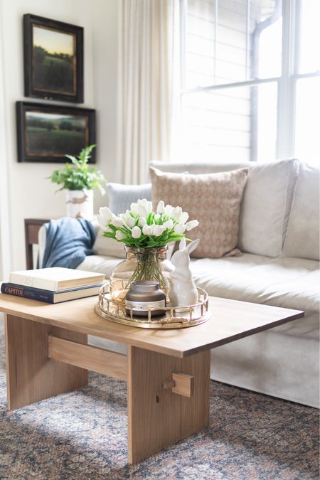 Spring living room with linen curtains, coffee table, Loloi rug, faux tulips 

#LTKSeasonal #LTKhome