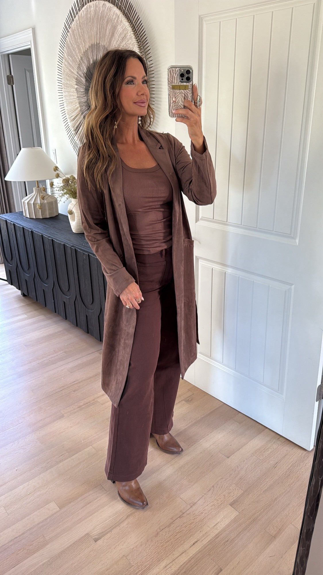 code betsy15 works for avara’s nadine coat, shirley jeans, and gloria bag. ♥️ i’m in a medium coat, and 28 bottoms - runs tts! amazon tank linked, boots are from freebirds, but no longer available. 

#LTKSeasonal #LTKFindsUnder100 #LTKSaleAlert