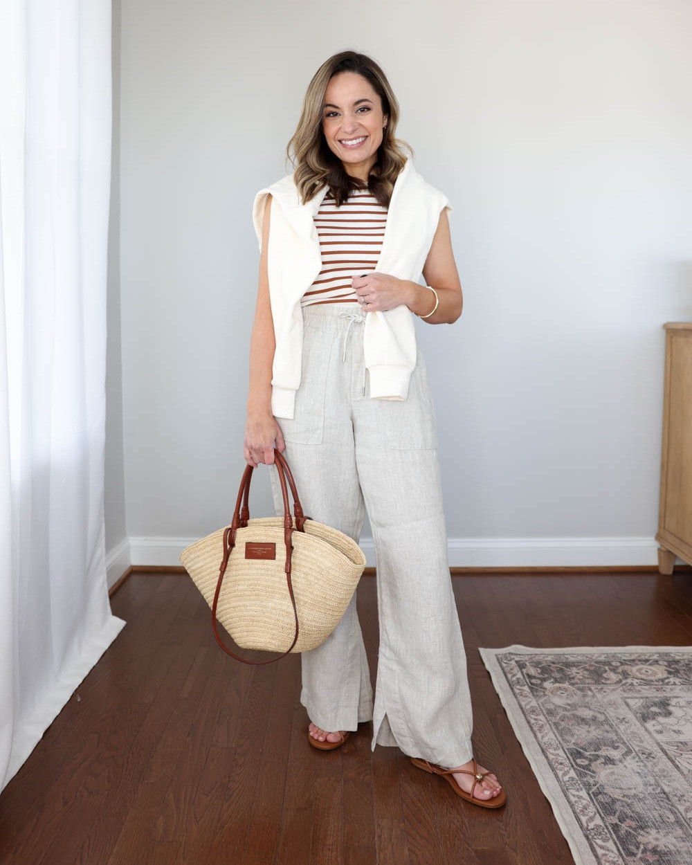 Casual summer weekend wear for petites!

Outfit 1:
Linen pants (Athleta): petite xxs (28” inseam) - Many of my readers found these to run large so I recommend a size down. 
Tank top (J.Crew Factory): xxs 
White sweatshirt (Athleta): xxs 
Straw bag (Sezane)
Sandals (Dolce Vita): tts

Outfit 2:
Linen shorts (Quince): 0 - fully lined 
White peplum top (Gap): petite xs 
Sandals: true to size 

Outfit 3:
Navy shorts (Aritzia): xs - mid thigh option 
Chambray top (J.Crew): petite 0 
Sandals (J.Crew): true to size 

My measurements for reference: I’m 4’10” and 105lbs. My bust, waist, and hip measurement is 32”, 24”, and 36”.