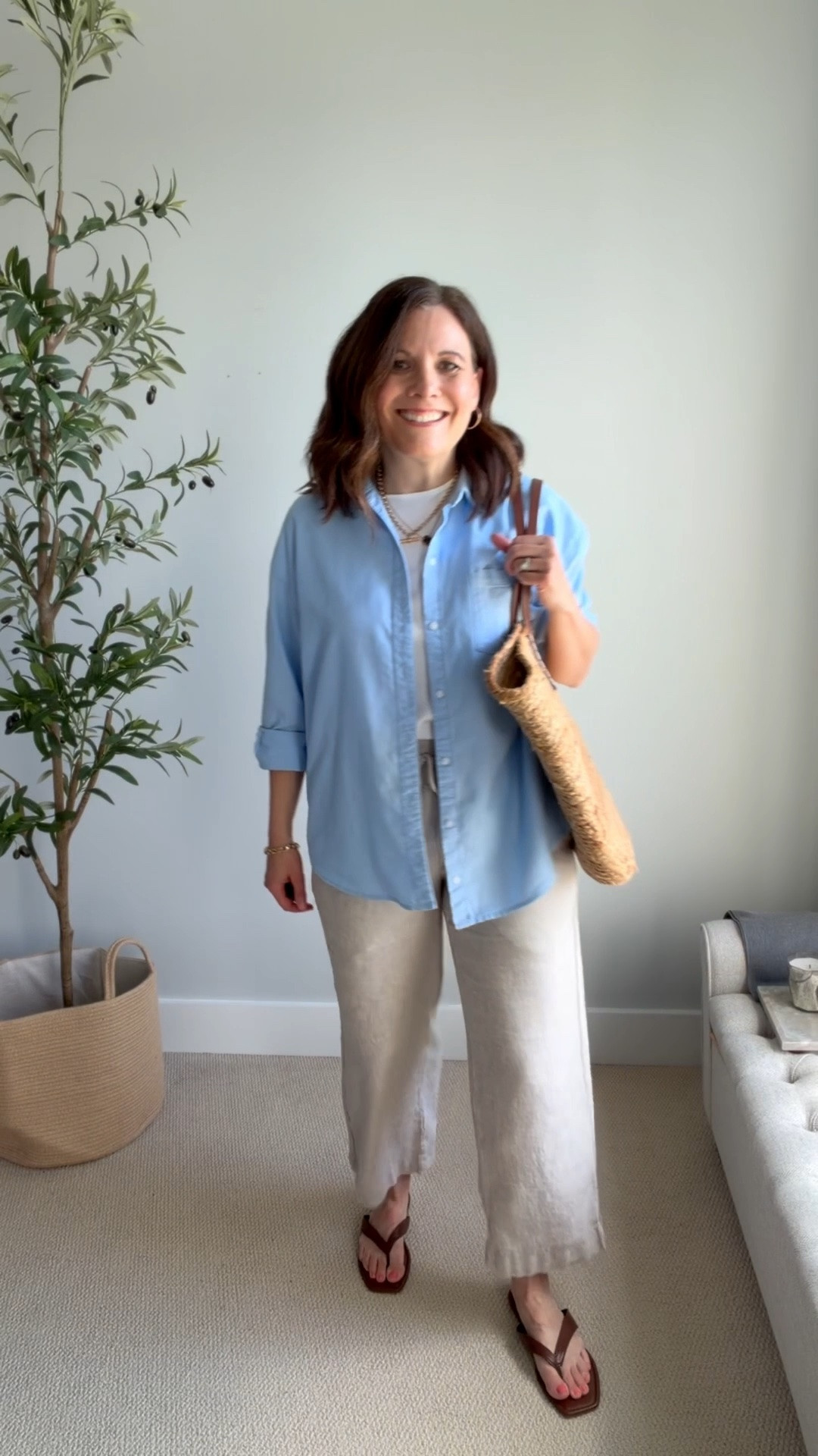 This outfit has that easy, breezy feel without looking too relaxed. I’m wearing a tucked-in white tee with a light blue button-down layered over it. A tank top is a great option too, if you wear them. 
These Quince wide leg khaki linen pants fit true to size. I’m in a medium in the 28 inch inseam.￼

#LTKSaleAlert #LTKOver40 #LTKMidsize