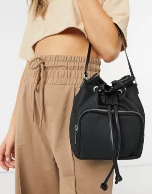 ASOS DESIGN – Beuteltasche mit Fronttasche aus schwarzem Nylon | ASOS (Global)