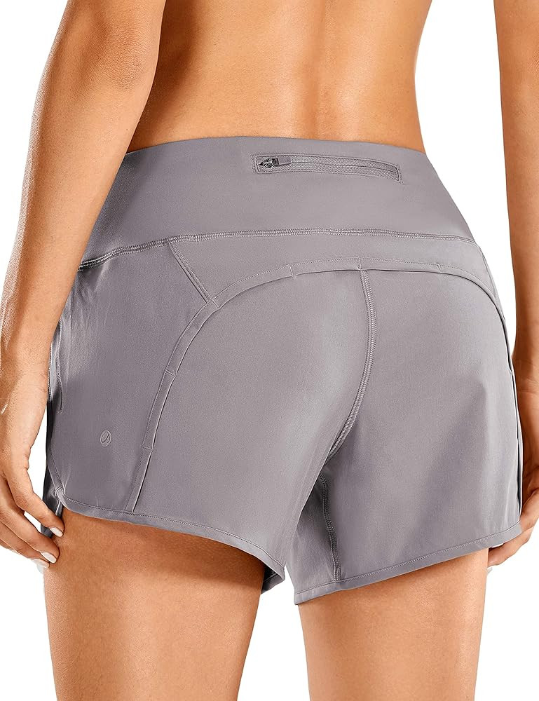 CRZ YOGA Women's Quick-Dry Athletic Sports Running Workout Shorts with Zip Pocket - 4 Inches | Amazon (US)