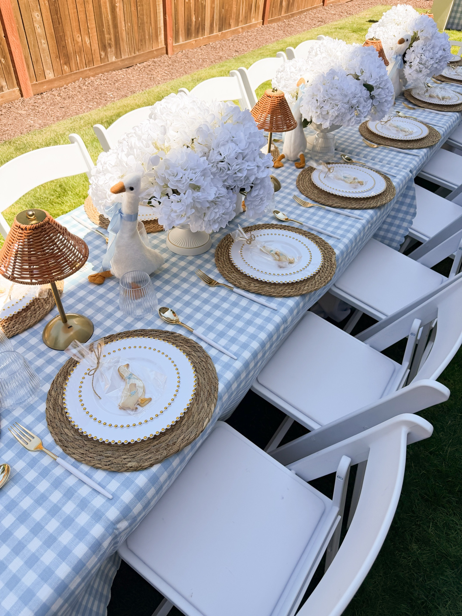 A silly goose is almost on the loose baby shower table setting!

Baby shower decorations, Rattan table lamps, blue ribbon, paper straws, gingham tablecloth, dinner plates, ceramic cake stand, artificial hydrangea, woven placemats, silverware, party decorations, party favors, paper napkins

#LTKsummer #LTKhome #LTKmaternity