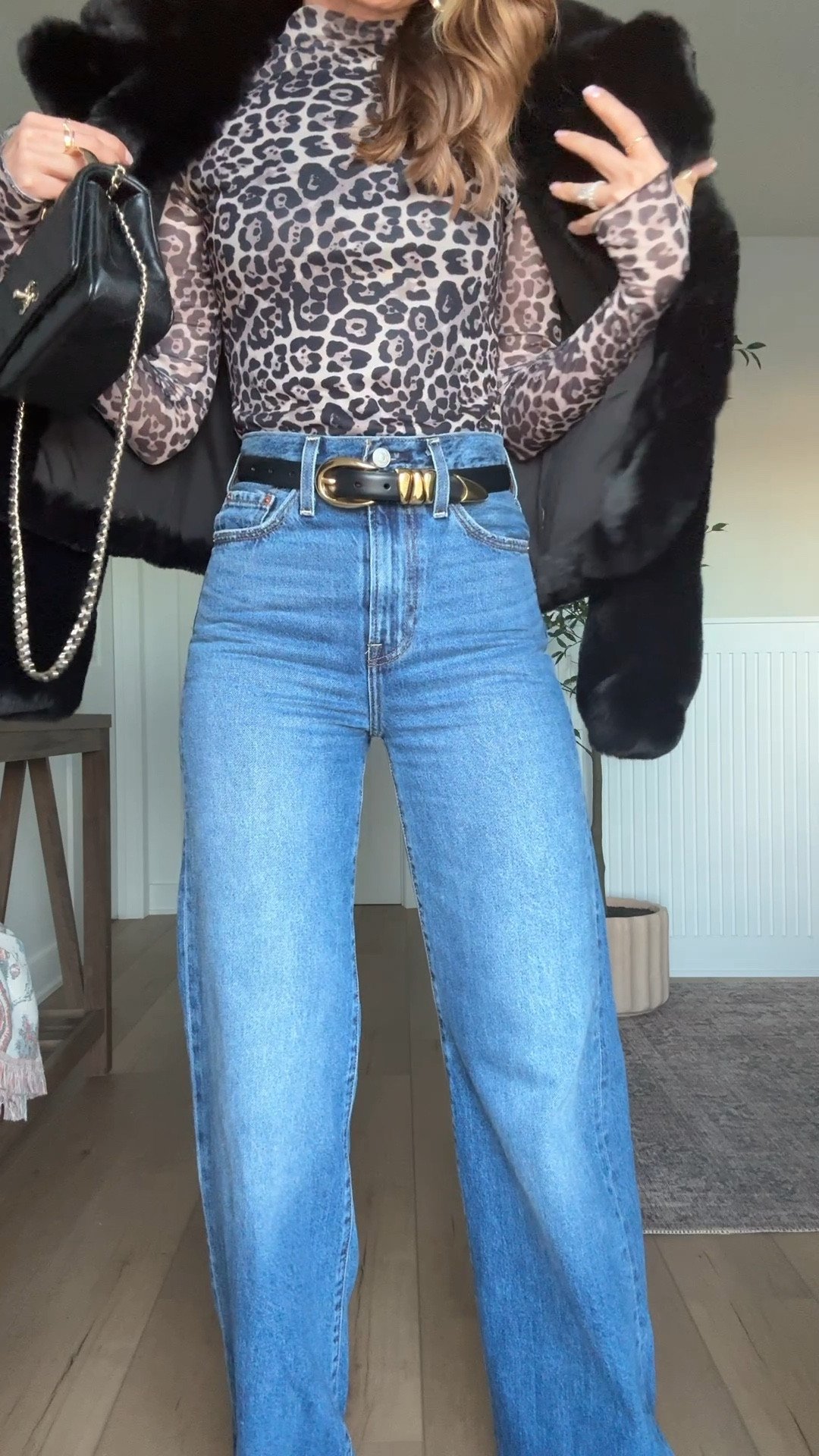 Date night outfit. Girls night out outfit. Vegas outfit. Concert outfit. Amazon mesh leopard top in XS. Levi wide leg ribcage jeans in 24 - runs a little big so size down if in-between. I shrunk mine in washer/dryer. Christian Louboutin boots - went up half a size. Walmart faux fur coat in XS. 

#LTKPetite #LTKootd #LTKgrwm