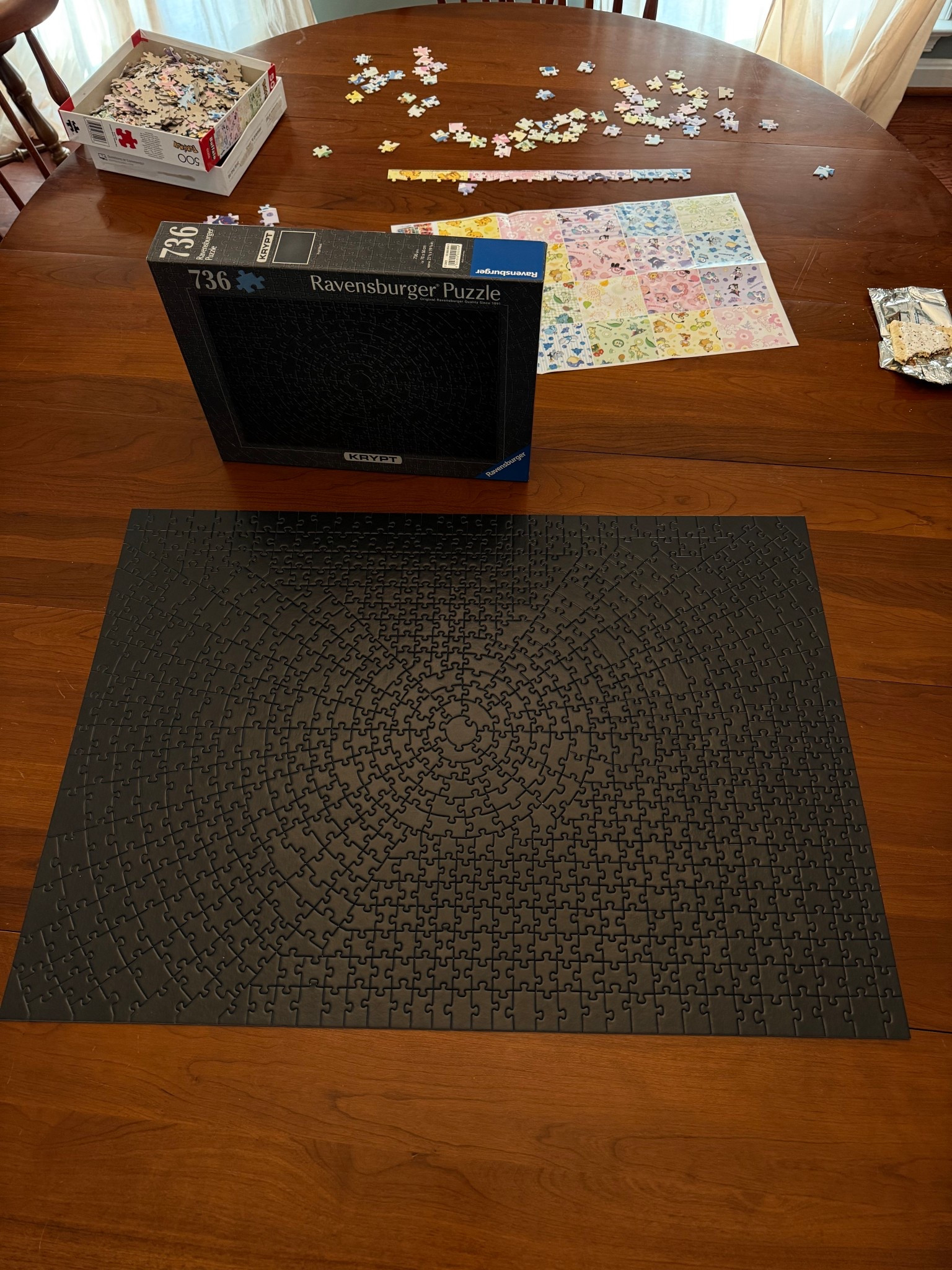 The all-black puzzle from my brother is officially complete! 🖤🧩 This thing has taken over our dining room table since Christmas. 10 people played a part in finishing it, one by one.

#LTKdayinmylife #LTKHome