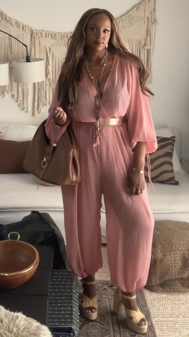 If you’re looking for that perfect "one-and-done" outfit that actually feels like pajamas but looks high-fashion, this is it. This dusty pink balloon jumpsuit is a total wardrobe MVP for the warmer months. I’m obsessed!
The balloon leg gives it that effortless, oversized "cool girl" shape without feeling heavy.
It’s incredibly lightweight and breathable so it’s perfect for those 80-degree days when you still want a full look.
This isn't your average bubblegum pink; it’s a muted, dusty rose that feels sophisticated and easy to style.
I’ve been wearing mine with chunky sandals but you could easily dress it up with pointed-toe heels and a sleek bun for dinner.
It’s designed to be oversized! I’m wearing my true size for that relaxed look, but size down if you want a bit less volume.
#SpringStyle #SummerOutfits   #Jumpsuit #EffortlessStyle

#LTKFestival #LTKMothersDay #LTKTall