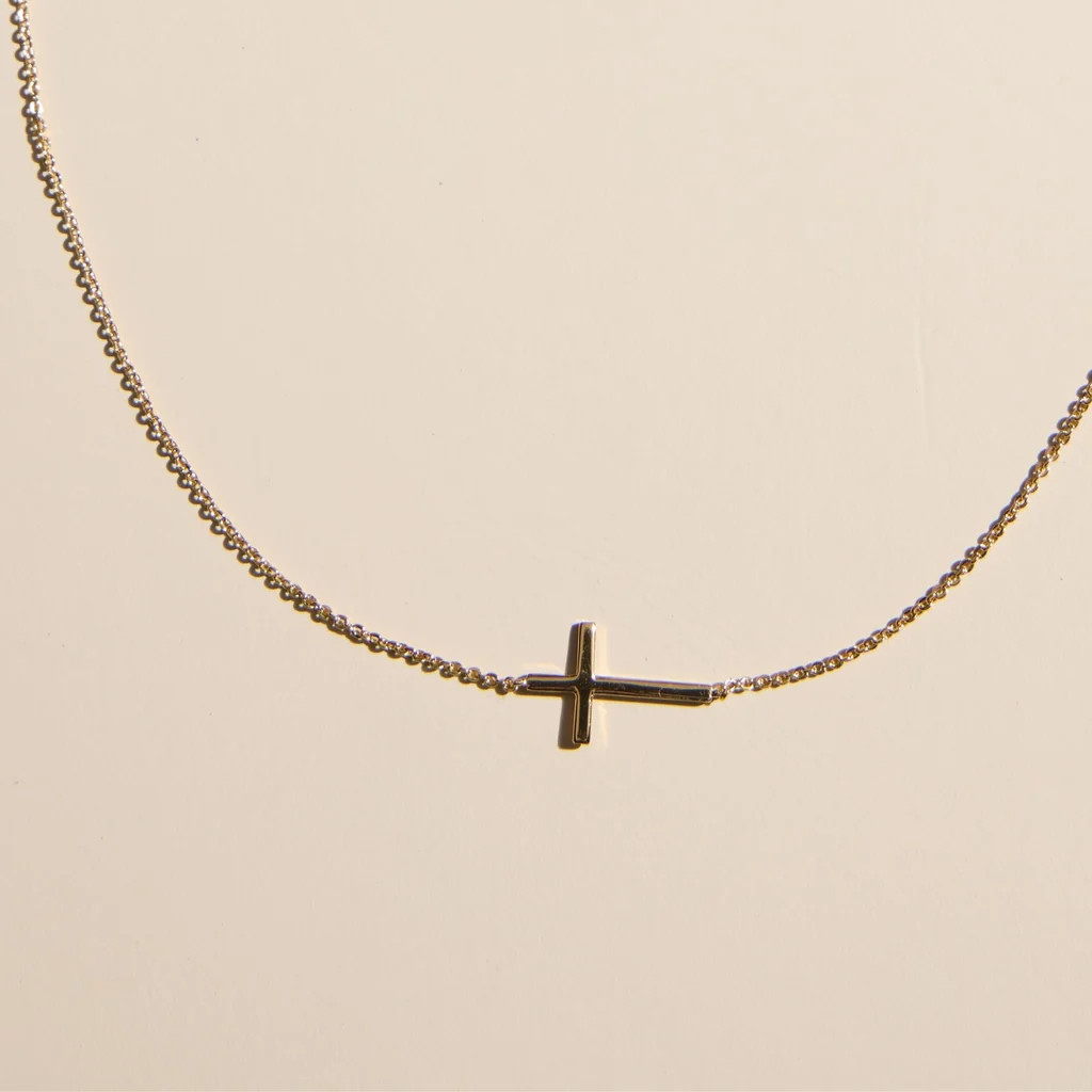 Gold Waterproof Sideways Cross Necklace | Nickel and Suede