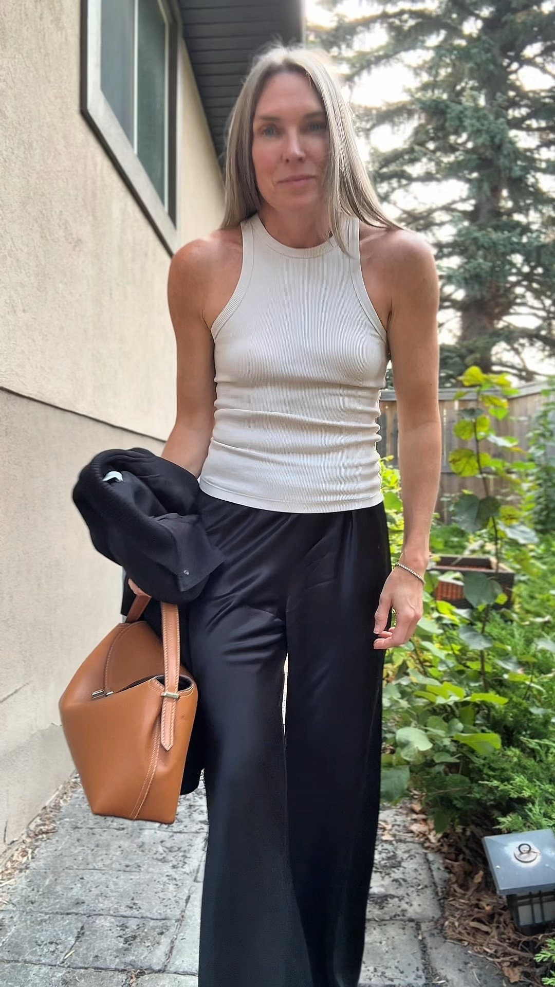 Work outfits don’t have to be boring.  These satin pants can be workwear too.  Added a cropped bomber jacket and the perfect pumps to elevate this look.  Pants are tts (I’m in xs).  Bomber is old Zara

#LTKstyletip #LTKcanada #LTKworkwear