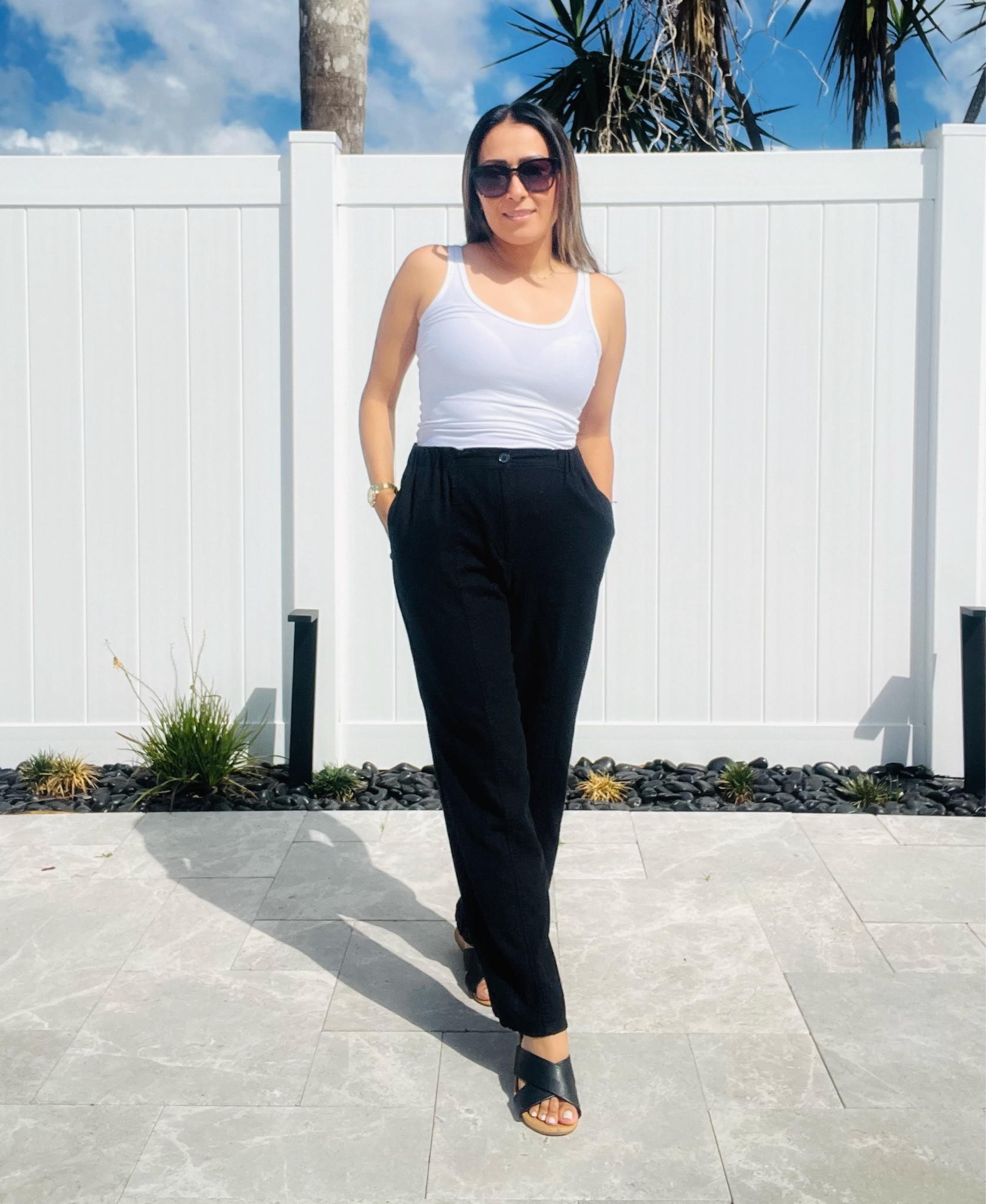 The easiest outfit formula for spring.

White fitted tank
Black wide-leg trousers
Simple slides

Clean. Comfortable. Always works.

Exact pieces aren’t available anymore, but I linked very similar options that give the same look 🤍

#LTKootd #LTKgrwm #LTKPetite