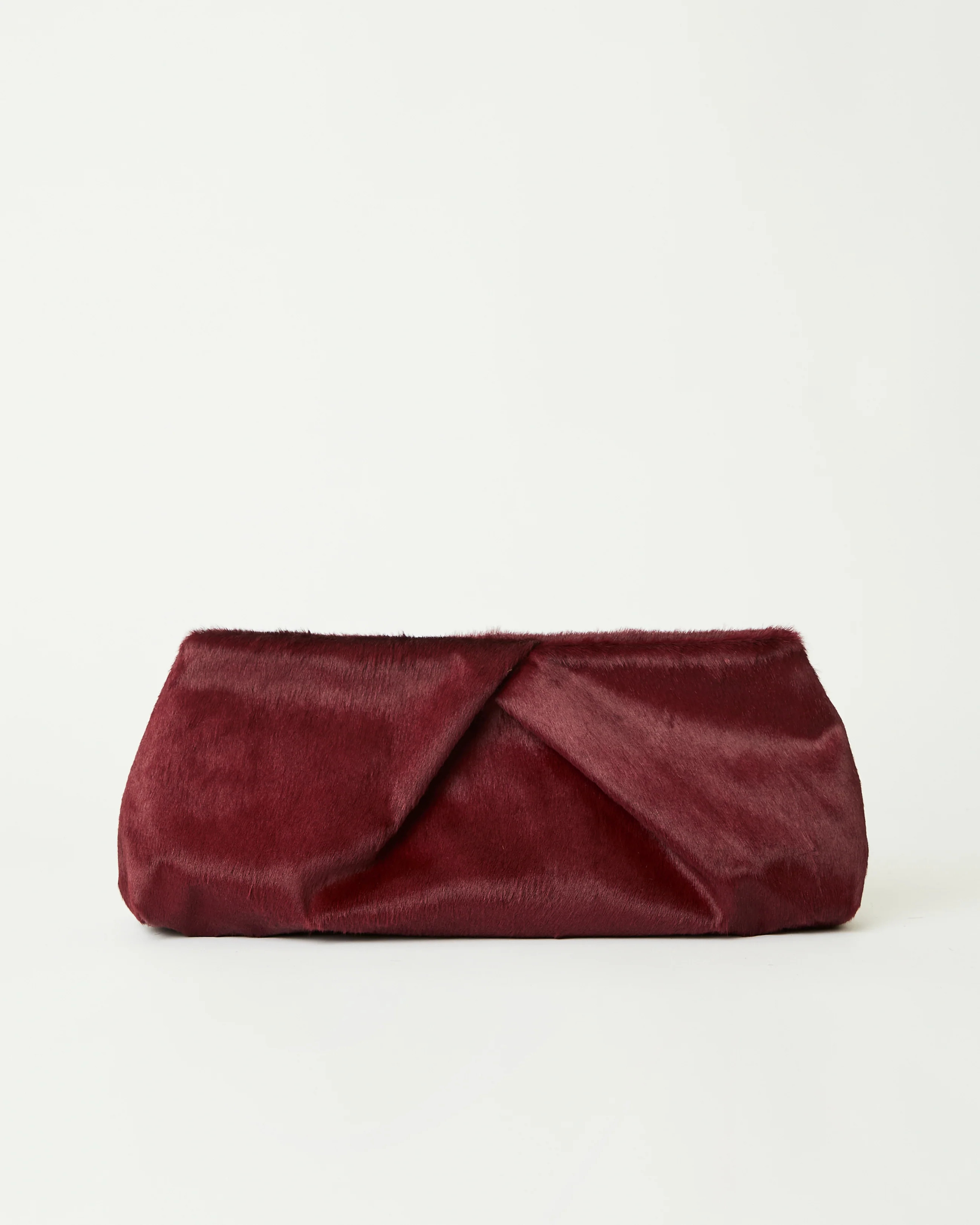 JINO CALF-HAIR CLUTCH | B-Low The Belt