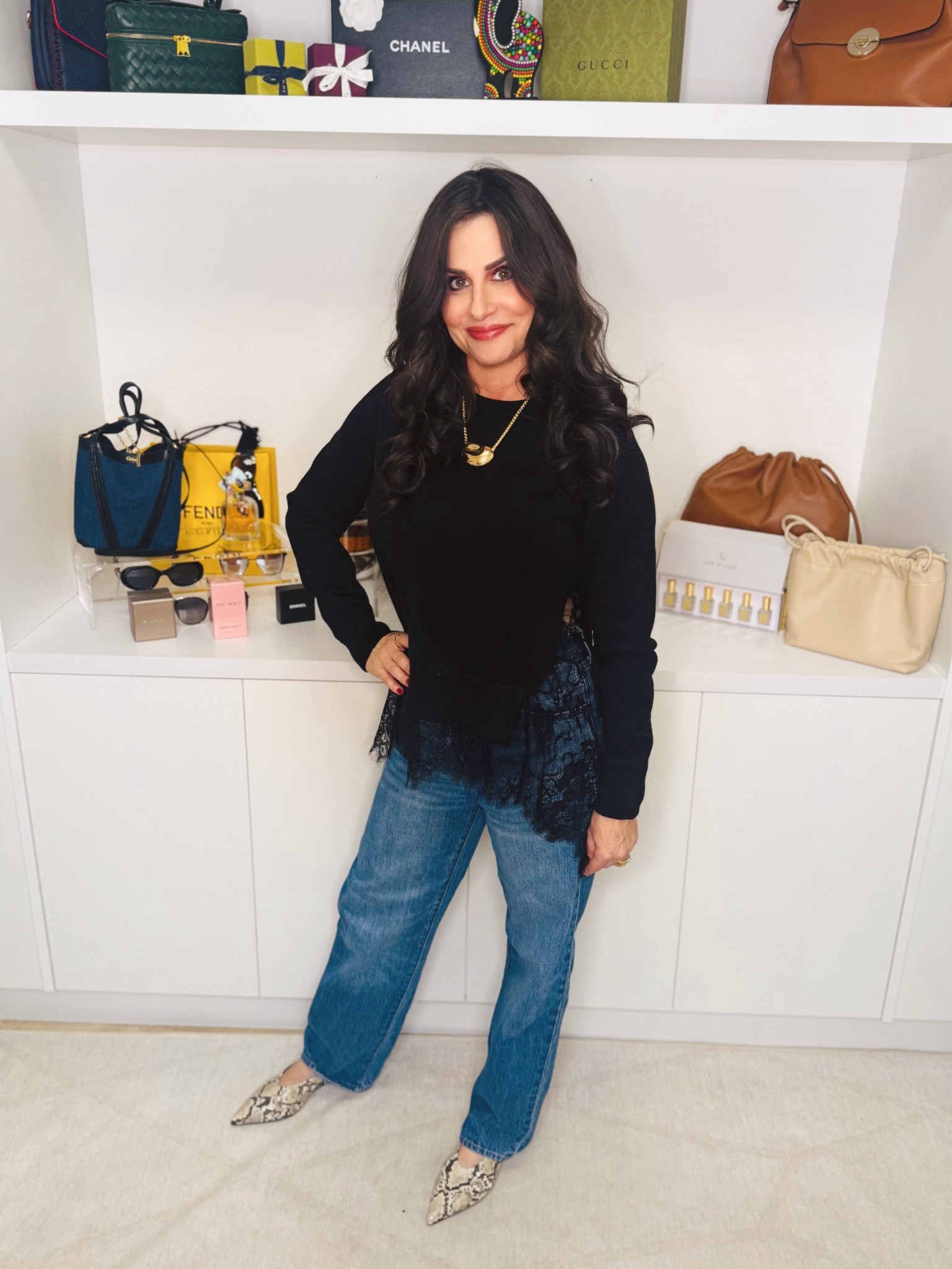 Loving this sweater it has lace paneling and is so on trend. it looks like you are wearing a cami under but you are not . So versatile can be worn with satin pants,  . a satin skirt . Wearing a sm , jeans 25 , heels TTS #lacesweater #blacksweater 

#LTKootd #LTKOver40 #LTKSeasonal