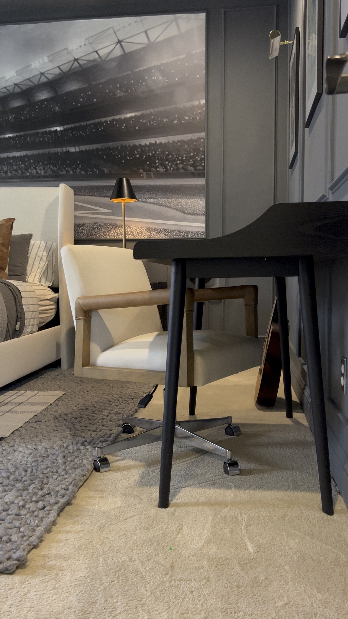 Neutral bedroom but make it kid-friendly. This space mixes soft textures, warm wood tones, and a bold sports backdrop for a room that feels both fun and timeless.

#LTKKids #LTKSeasonal #LTKHome
