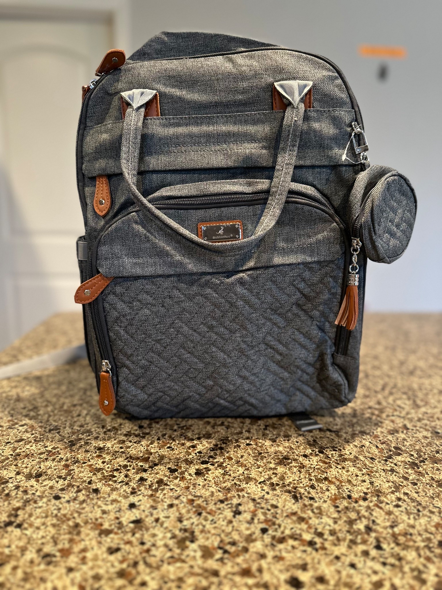 The best diaper I have used! It holds so much especially for 2 toddlers and is super easy to put on your back or hold on the top strap 

#LTKTravel #LTKBaby #LTKFamily