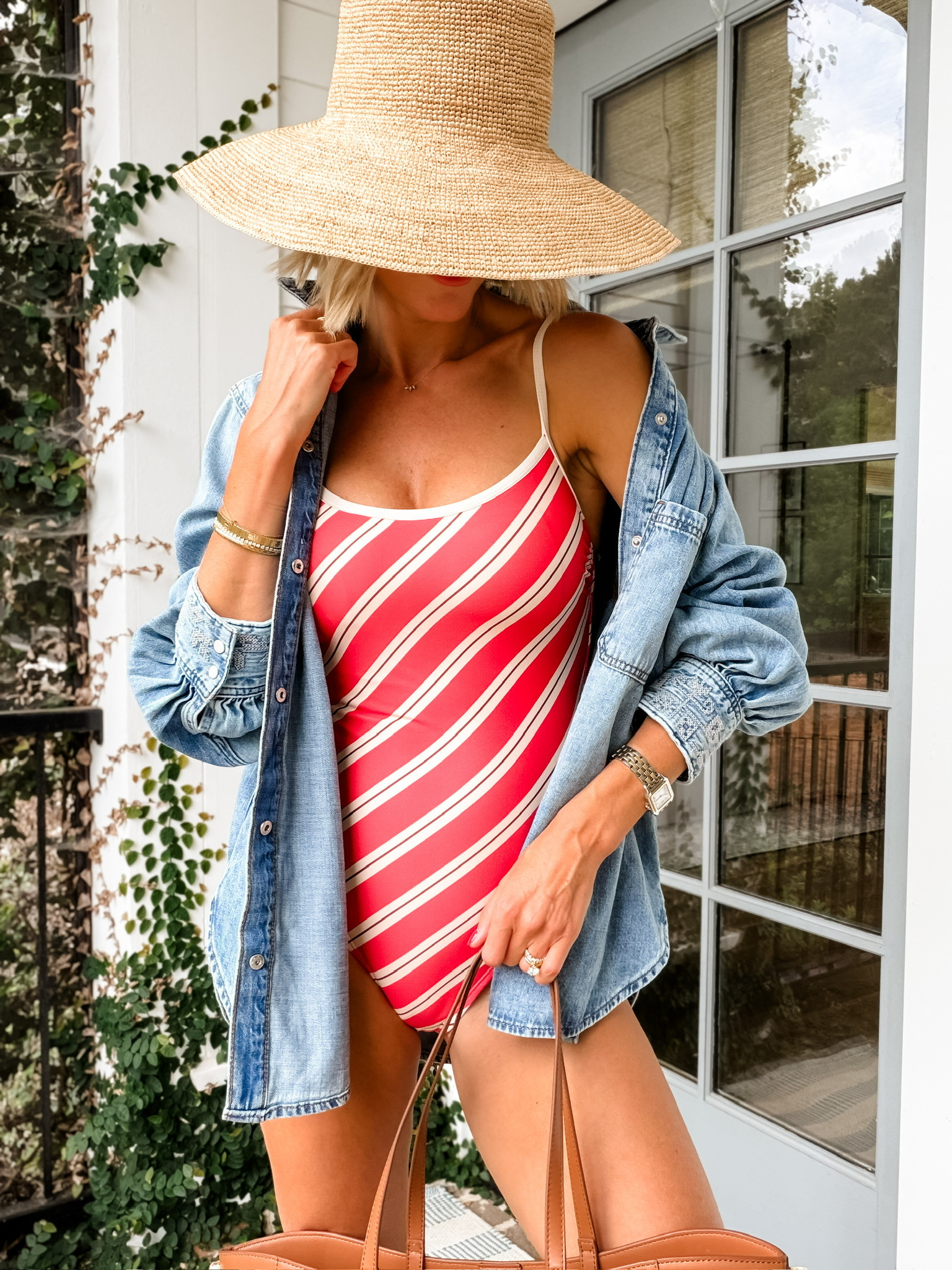 This red and cream striped swimsuit is perfect to wear for the 4th this weekend if you're going to the pool, lake, or beach! I also love this denim shirt with it as a cover up! Wearing S in swimsuit & M in denim shirt!

Loverly Grey, Target, swimsuit, denim shirt, straw hat, July 4th outfit, red swimsuit, one piece swimsuit 

 #LTKSeasonal