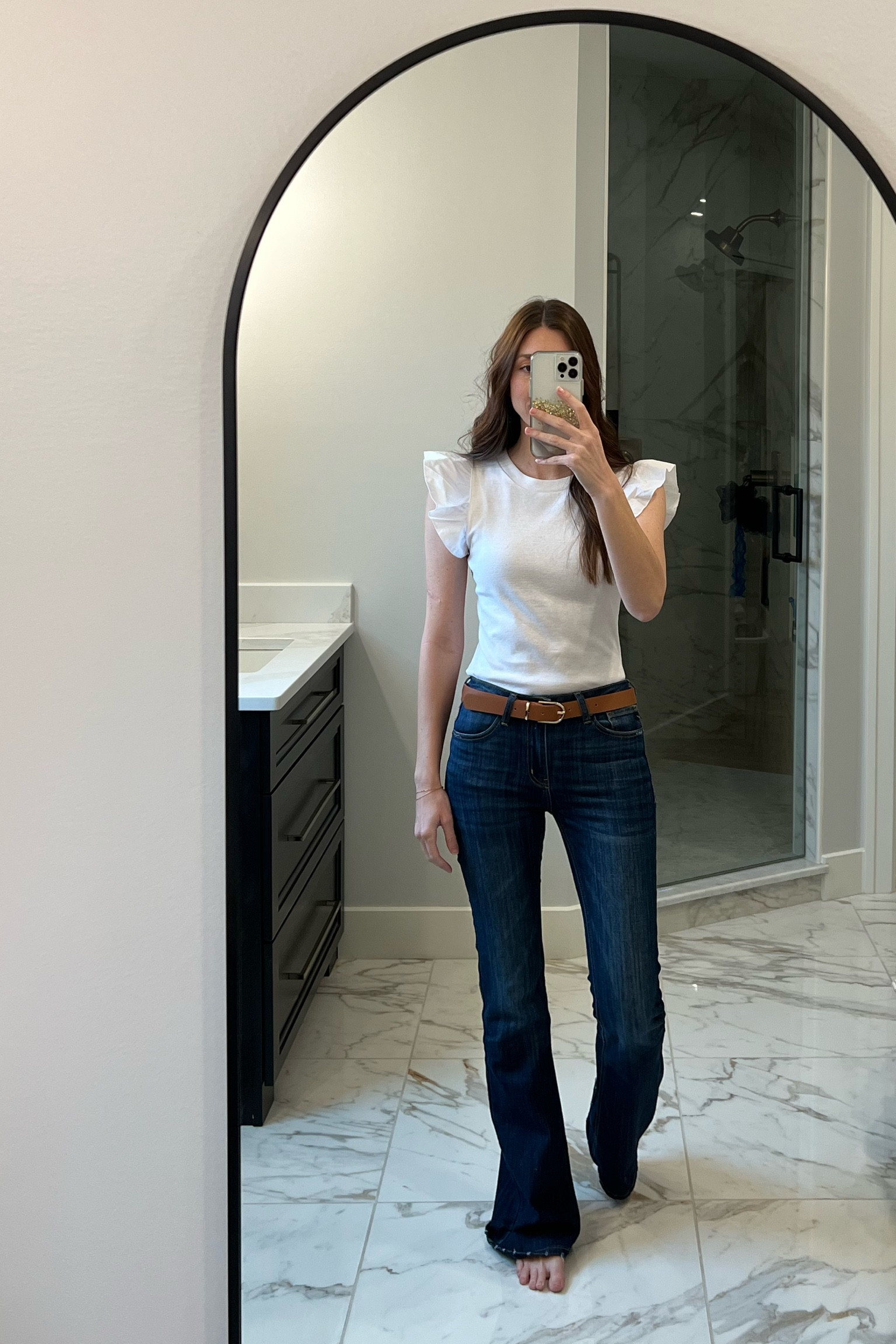 White ruffle sleeve bodysuit from Walmart  

#LTKfit #LTKFind #LTKstyletip