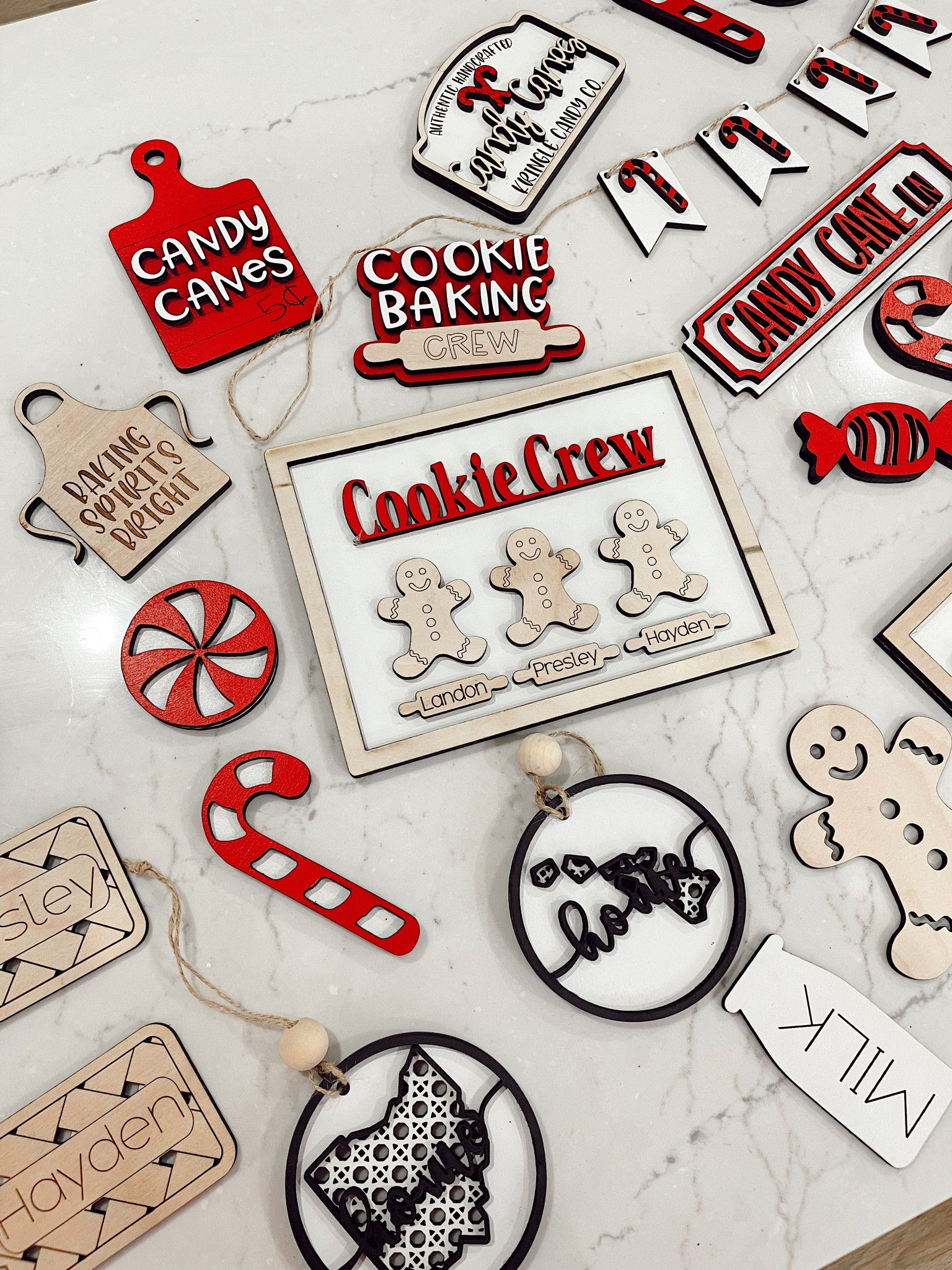 Homemade keepsake ornaments and gingerbread cookie themed tiered tray decor 

#LTKCyberweek #LTKSeasonal #LTKHoliday