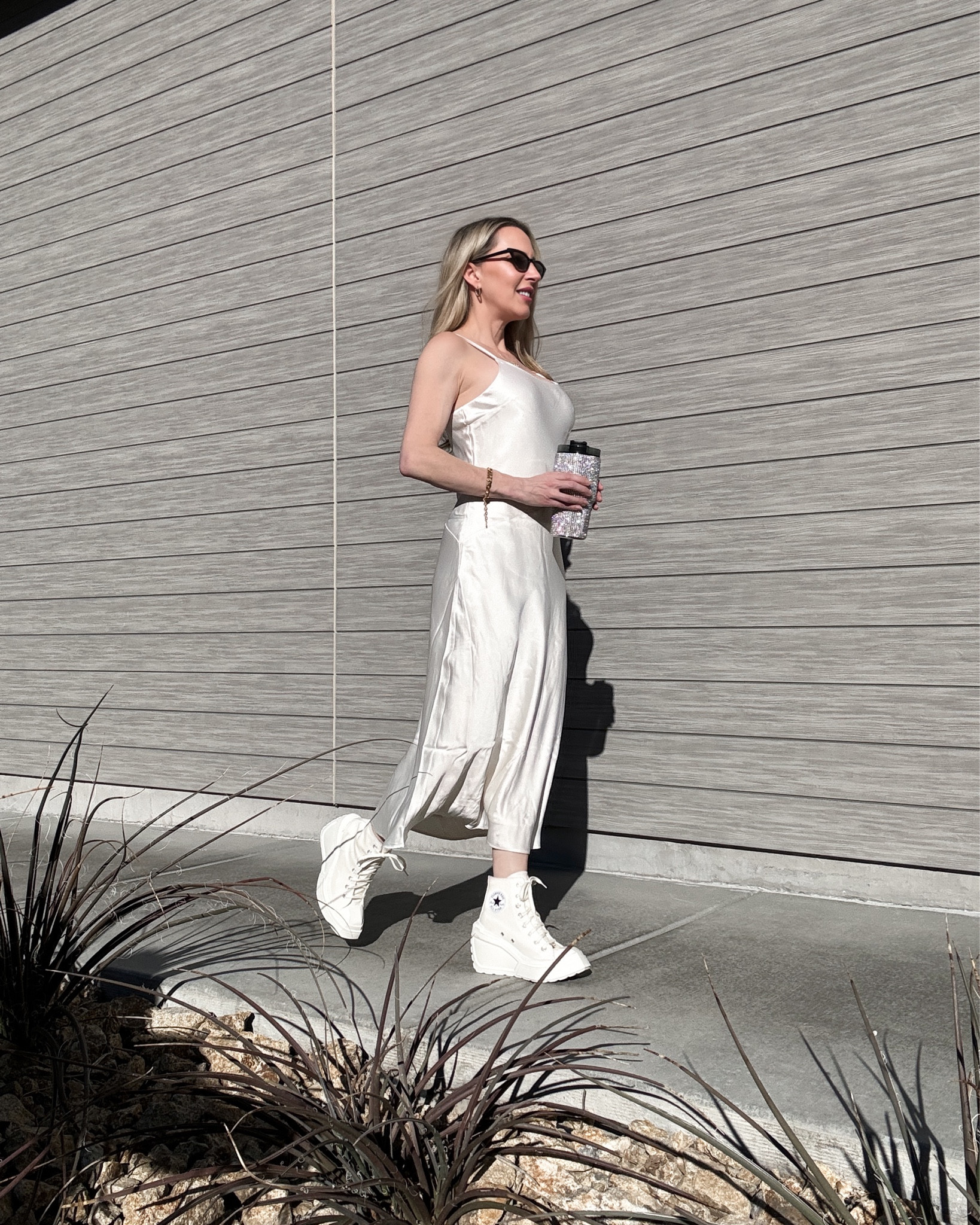 How to style wedge sneakers in Spring - Converse Chuck wedge sneakers Hailey Bieber inspired outfit: cream satin slip dress with adjustable straps on sale!

#LTKstyletip #LTKfindsunder50 #LTKsalealert