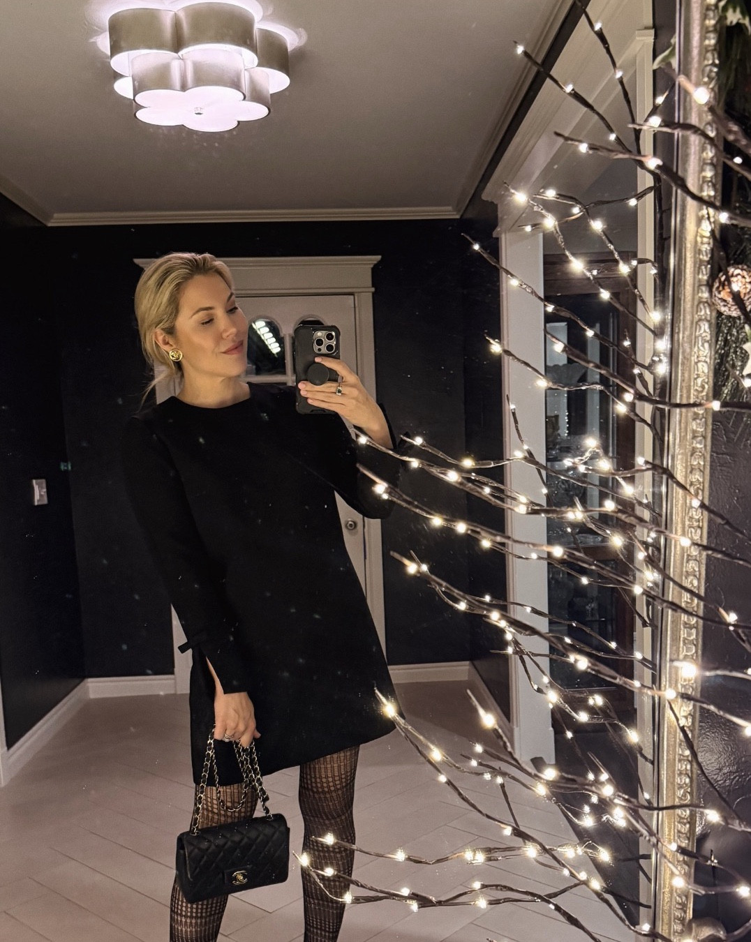 A simple black dress with bows details on back and sleeves 

#LTKHoliday #LTKSaleAlert