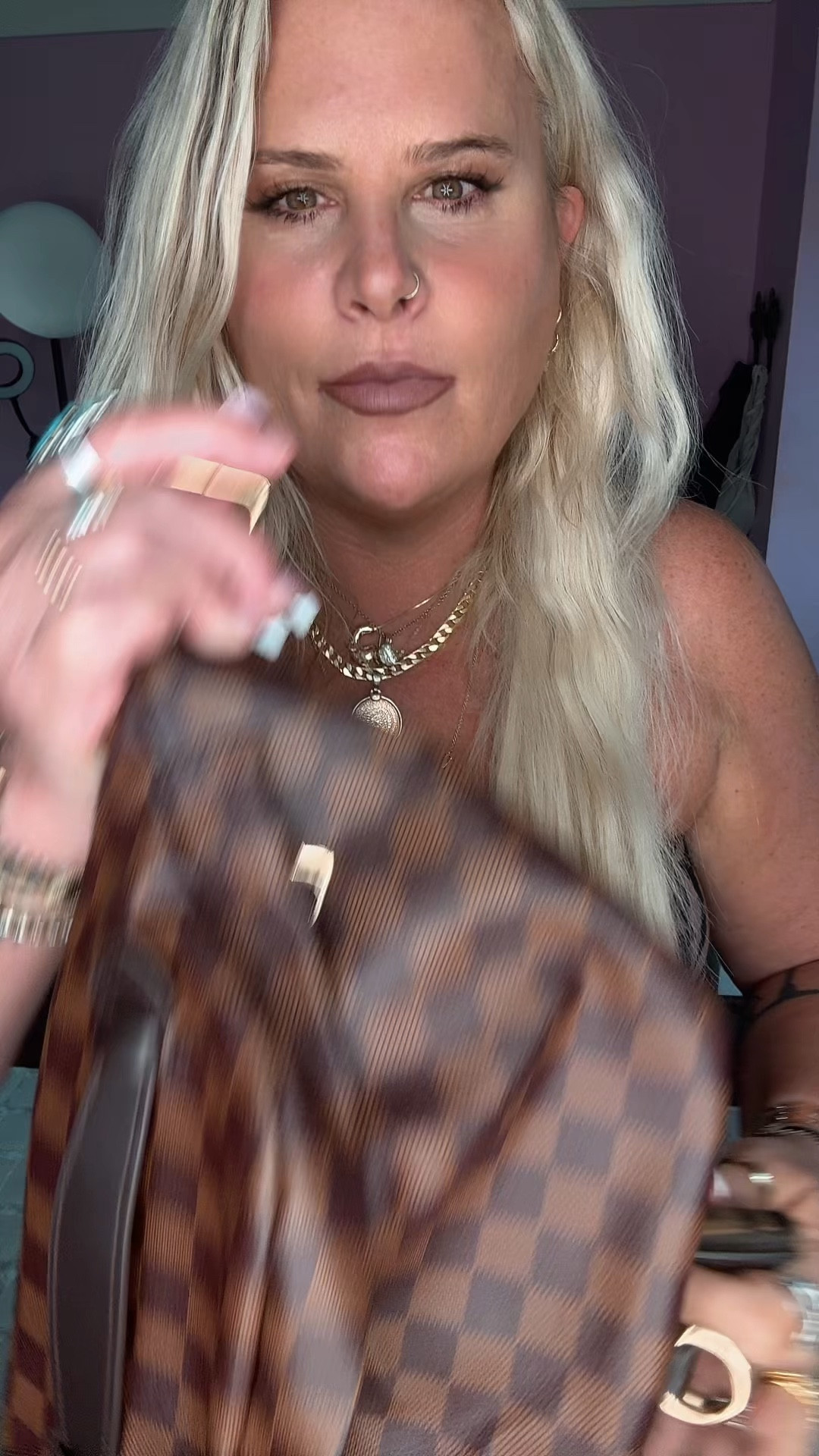 I love pairing an inexpensive bag with an expensive strap. I think it really gives it a vibe and you get a lot more bang for your buck ! Animal prints are really really in this season. I really love this dress. It is so flattering. I think tube tops are flattering when you are midsize. I’m a 38C across. I am wearing a size large in this. I also love pairing it with some Sambas. I think it creates kind of a cool edgy vibe. Loving all my jewelry especially the new jewelry from fiveandtwo . 🤎

#LTKStyleTip #LTKMidsize #LTKOver40