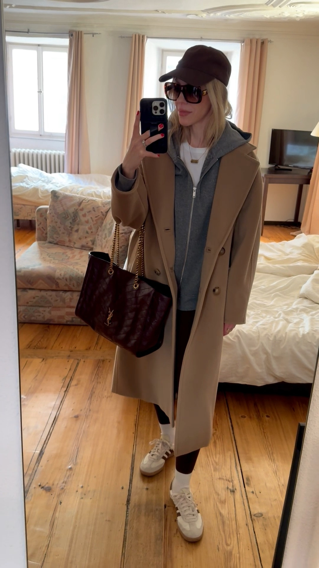 Casual chic outfit, camel coat, travel look, chocolate brown leggings, Adidas Samba sneakers, airport outfit, burgundy YSL tote bag 

#LTKTravel #LTKdayinmylife #LTKActive