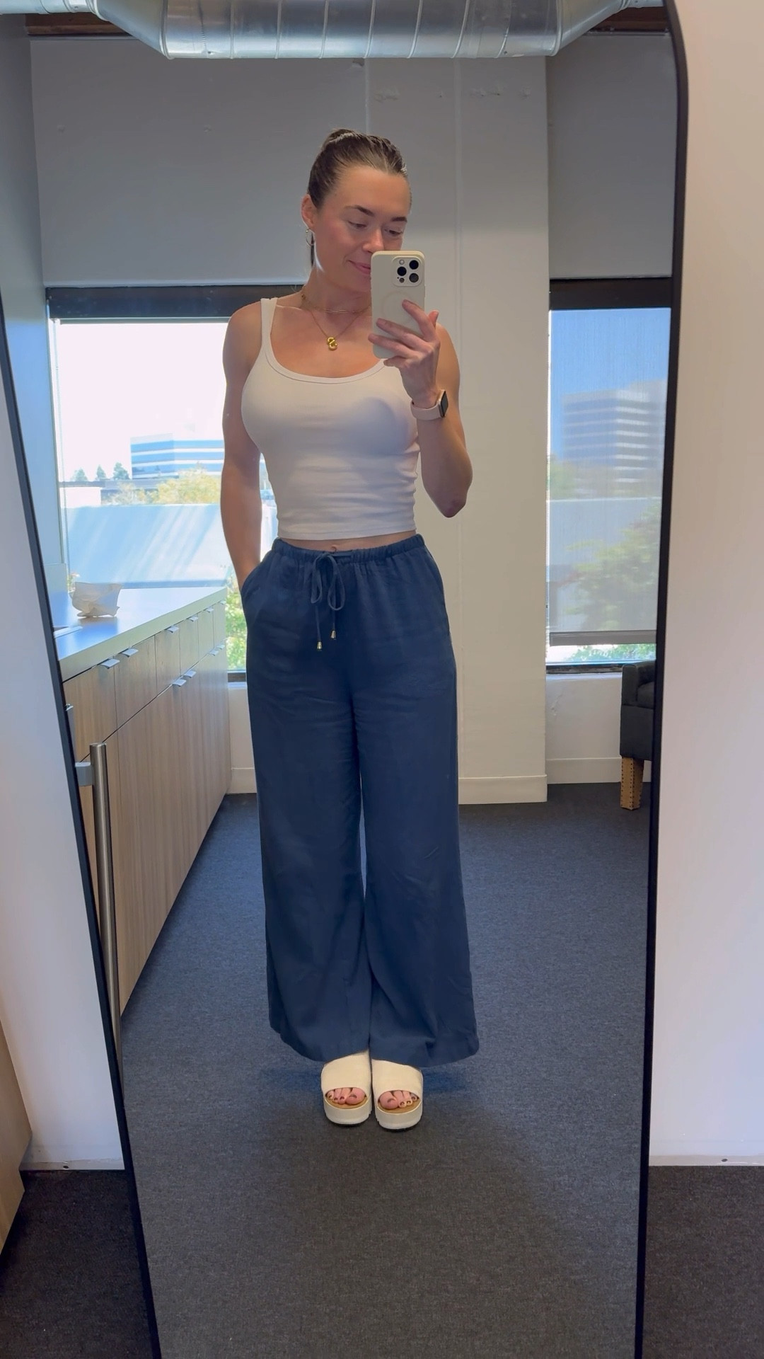 Obsessed with these new navy linen pants I just got in from Amazon. Perfect to dress up or down for work or to wear to brunch with friends 👌🏻 

Size small in the pants & cropped tank. Size 7 (true to size) in the TOMS mules.

#LTKSummerSales #LTKStyleTip #LTKFindsUnder50