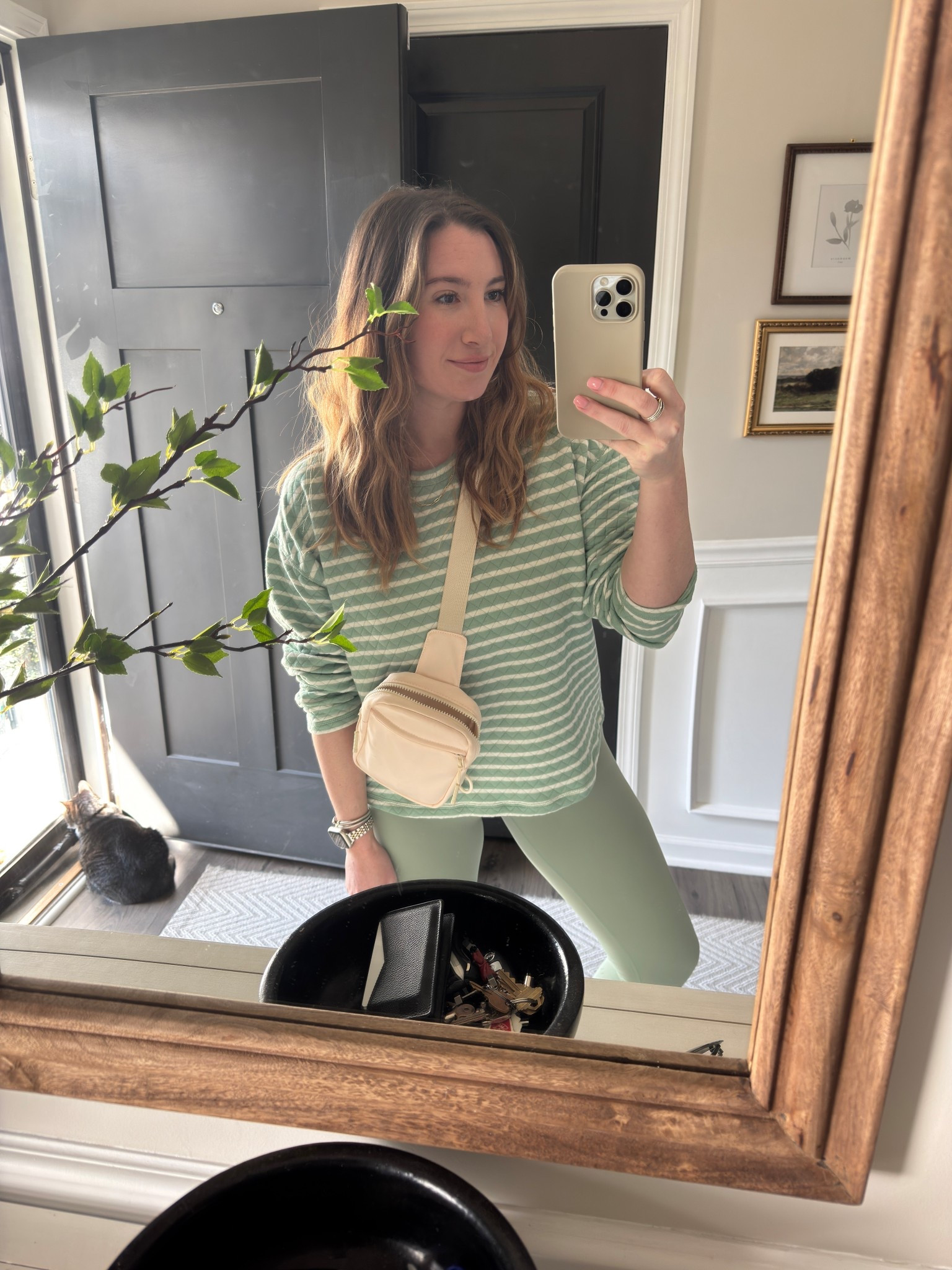 No idea why my mirror makes everything look warped 😅 loving this soft eucalyptus shade for spring featuring the softest (and affordable!) workout leggings 🌿 

#LTKSeasonal #LTKFindsUnder50 #LTKActive