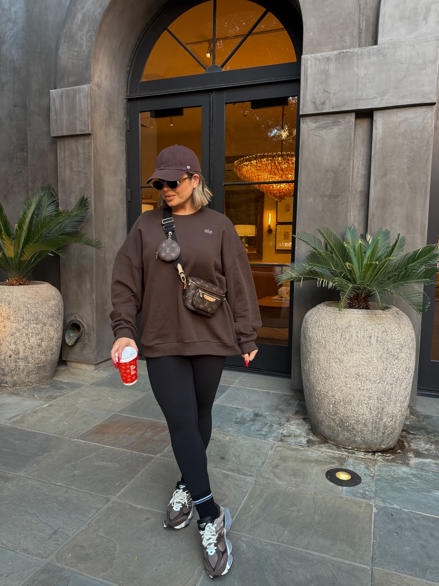 Sweatshirt xl for oversized cozy fit 
Leggings linked exact & another favorite affordable Amazon version that are honestly just as good IMO ( same feel ) 
These leggings I do a 10 amazon ones size L 
Bag I can’t link here, but it’s the Louis Vuitton mini bum bag, and I bought the strap separately.

Lip combo 
Liner - shade natural 
Lipstick - shade Kim KW 
#lululemon #alo #newbalance #ootd 

#LTKFindsUnder100 #LTKActive #LTKMidsize