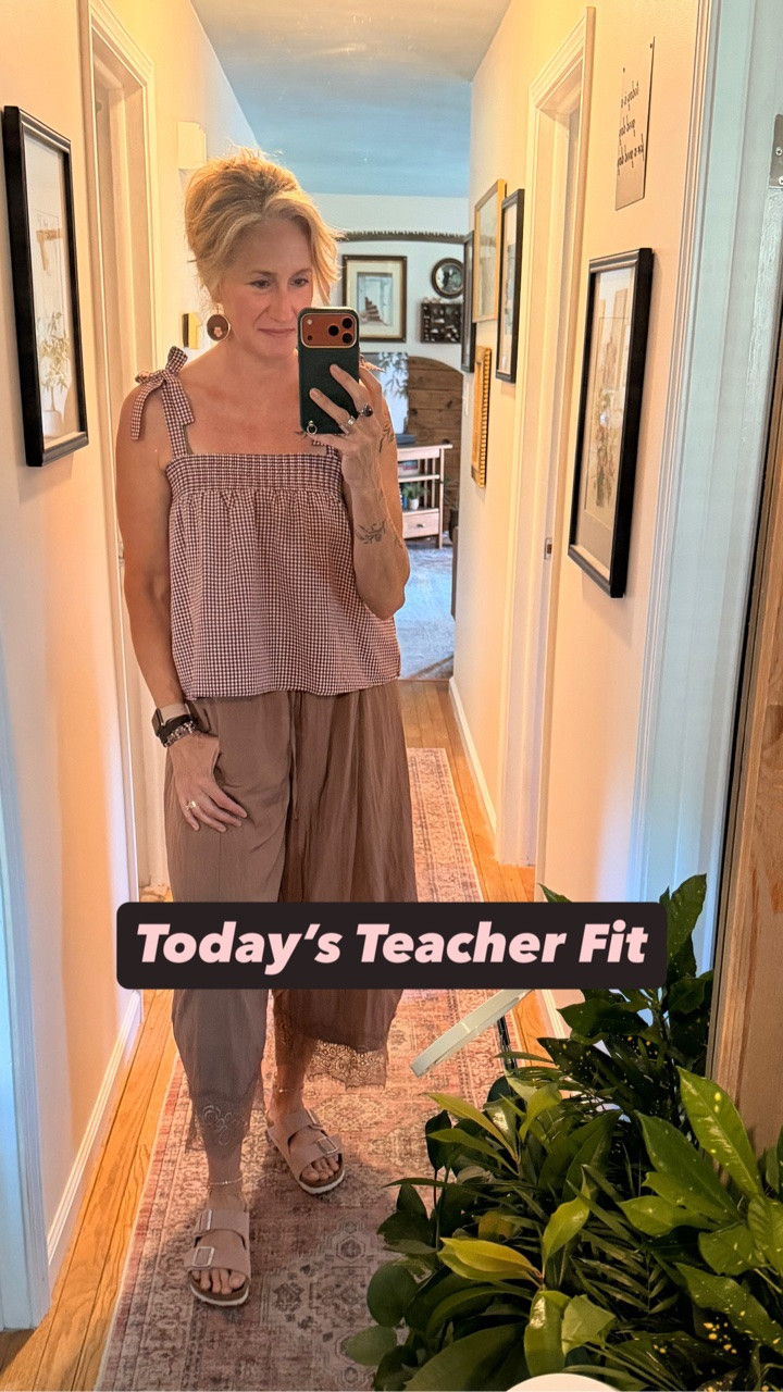 The last few days of school always have a certain energy. 😂

The kids are suddenly discovering missing assignments, acting completely shocked, and I’m over here thinking… “Interesting, because I’m pretty sure I’ve mentioned it about 100 freaking times.” 🤦‍♀️📚

Meanwhile, I’m just trying to survive another hot day in a classroom with no A/C. ☀️🥵

Today’s outfit is doing the heavy lifting:

💕 Lightweight silky barrel-leg pants with the prettiest lace detail at the hem
💕 A summer-weight gingham top
💕 Pink Birkenstocks because comfort wins every time
💕 Thrifted handmade earrings that might be my favorite part of the outfit

Honestly, thrifting is magical sometimes. You can find the most beautiful one-of-a-kind pieces that nobody else is wearing. ✨

LTK: https://www.shopltk.com/explore/Teacher_Fits_by_Lora

#LTKStyle #AmazonFashion #TeacherStyle #TeacherOOTD #SummerOutfit

#LTKgrwm #LTKootd #LTKmorningroutine