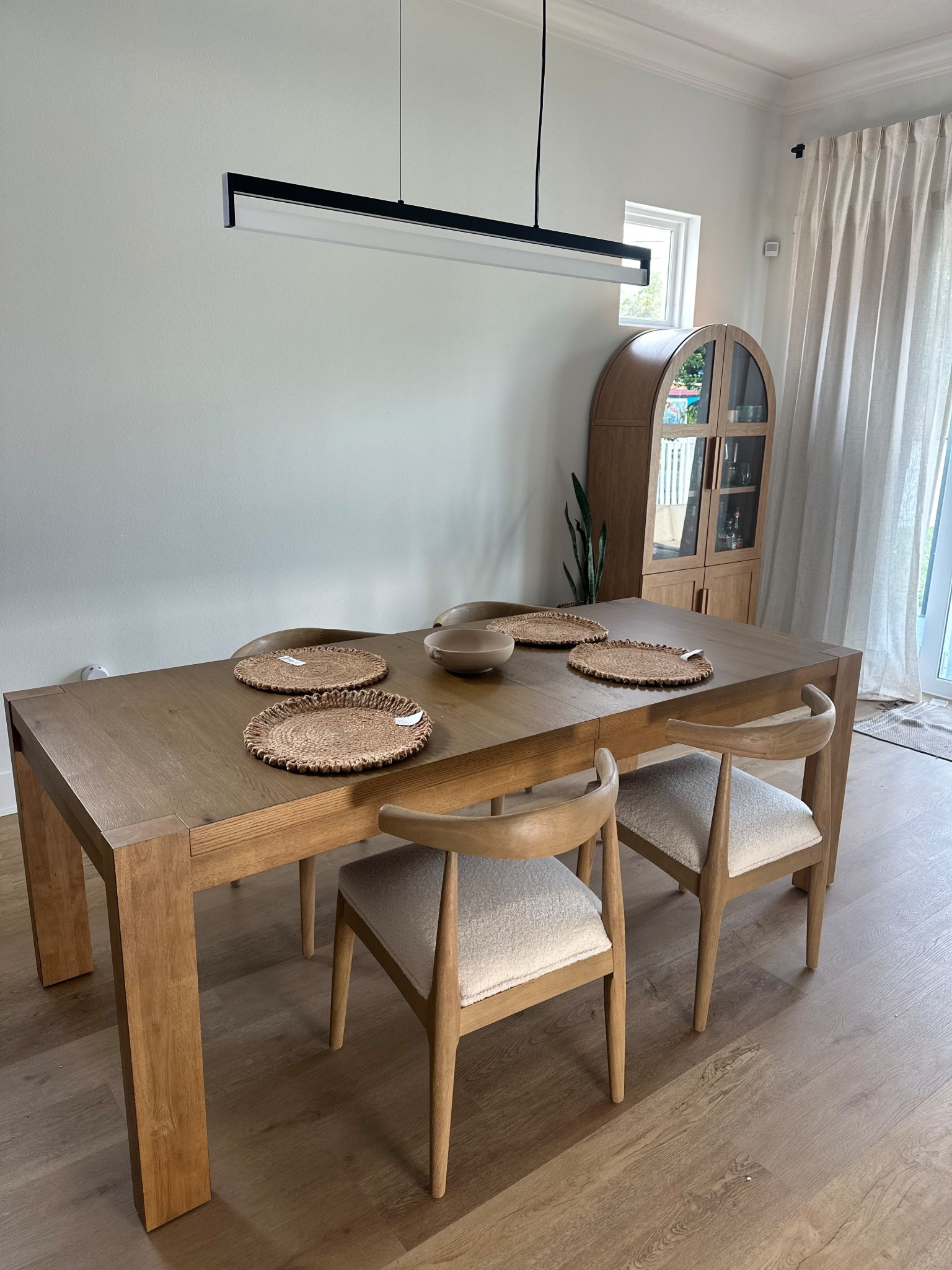Birch Lane Laroche Extendable Dining Table with the chairs also from Birch Lane Asheboro Upholstered Wing Back Side Chair. My placemats and the decorative bowl are from Walmart  

#LTKHome #LTKStyleTip #LTKKids