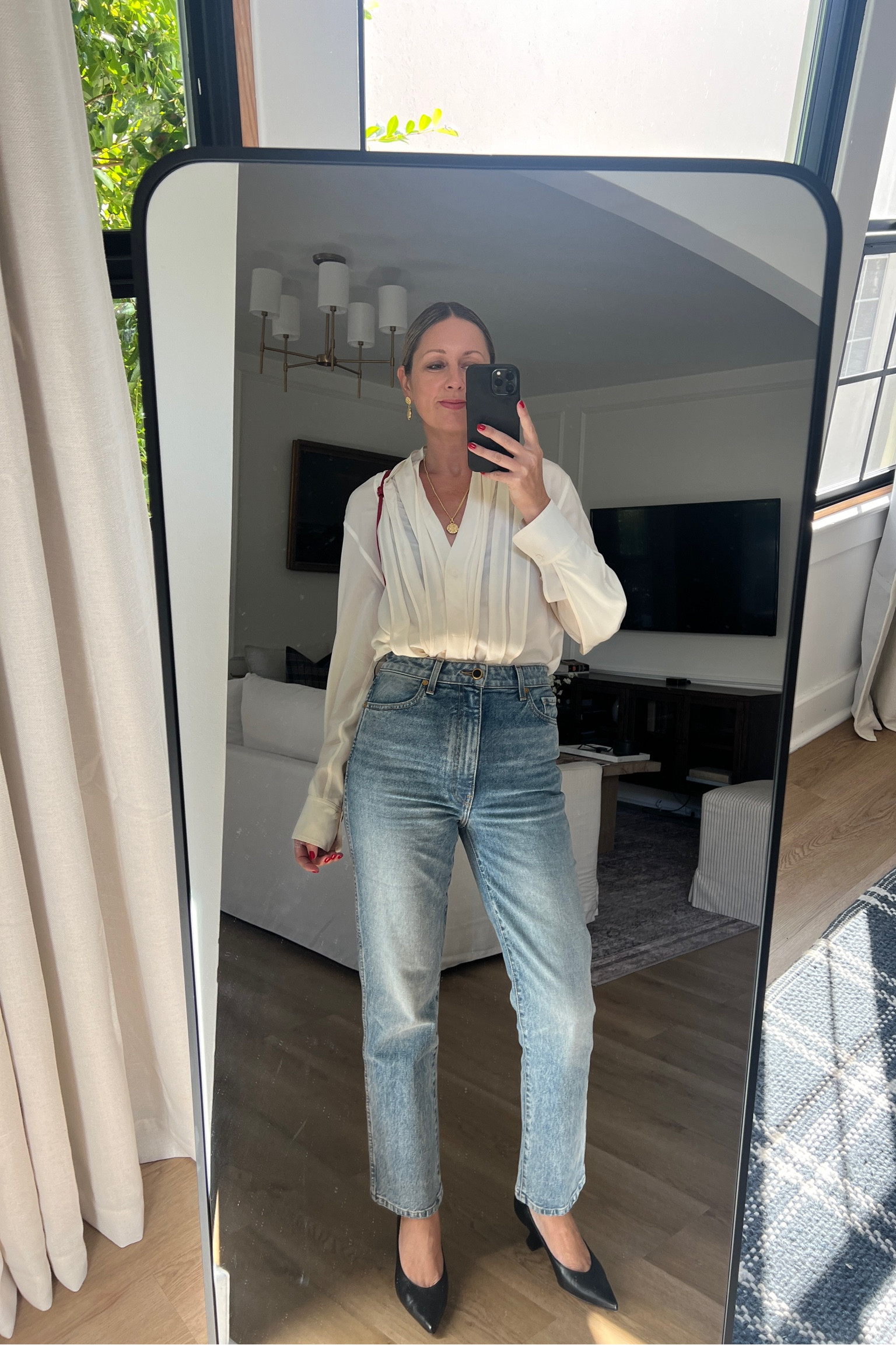 Cream Ruffle Blouse + Khaite Jeans + Gold Vintage Jewellery (I sized up one in the jeans)  

#LTKeurope #LTKfindsunder100 #LTKstyletip