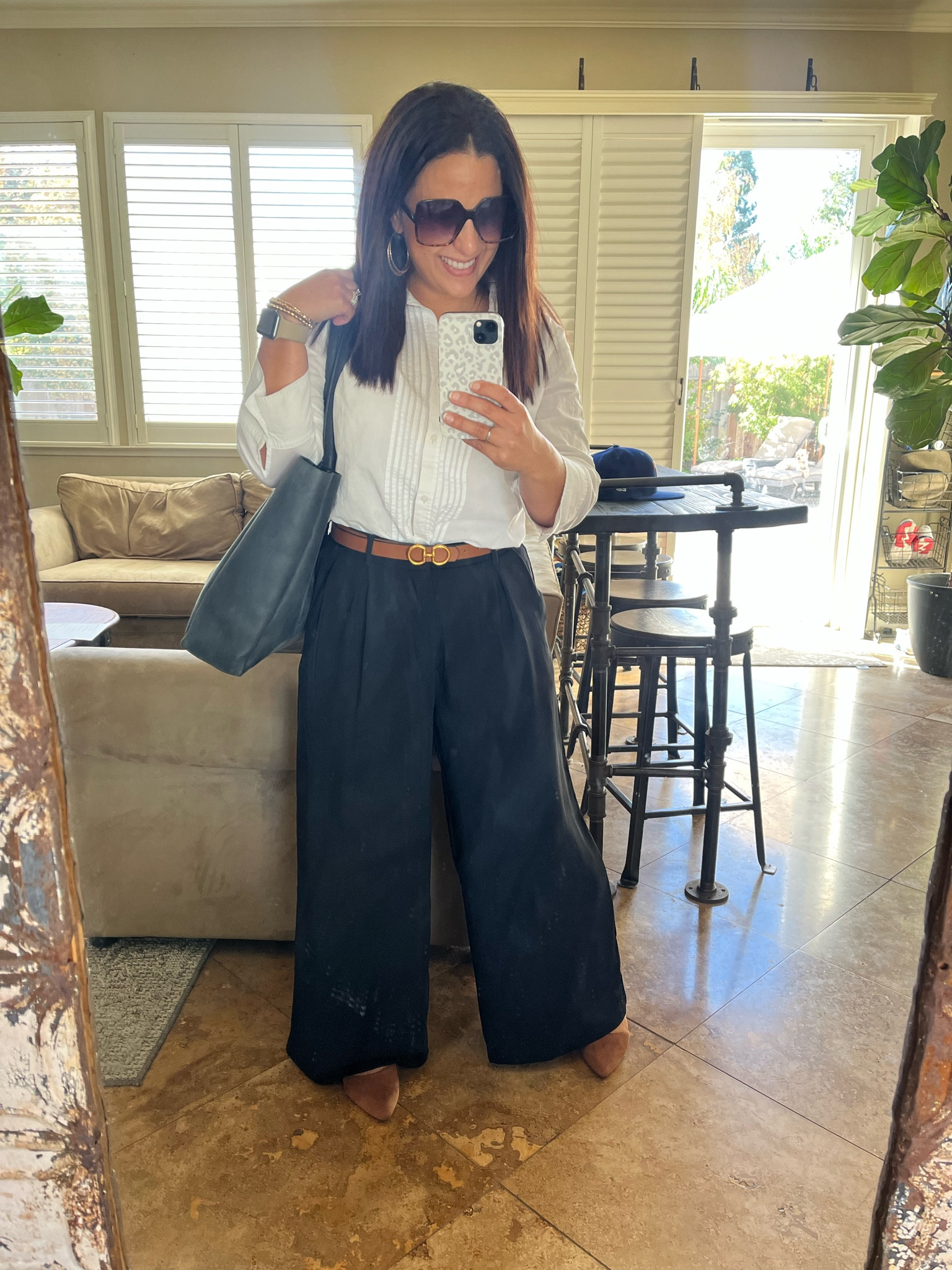 What a day!?! Classic white collared shirt and wide leg trousers for an easy fall workday outfit. My belt is reversible, the other side is black. My pointed toe flats have memory foam and are perfect for teaching. 
Fall outfit
Teacher outfit


#LTKstyletip #LTKover40 #LTKworkwear