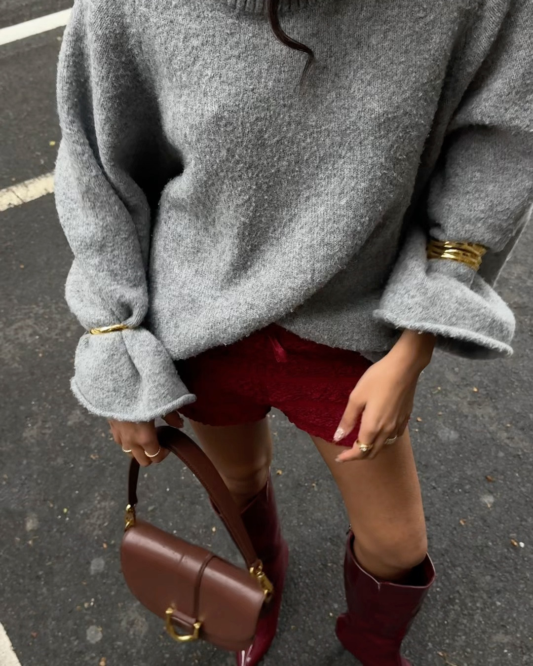 Oversized jumper, mini shorts and cherry red boots outfit 

#LTKaustralia #FashionMonth #LTKspring
