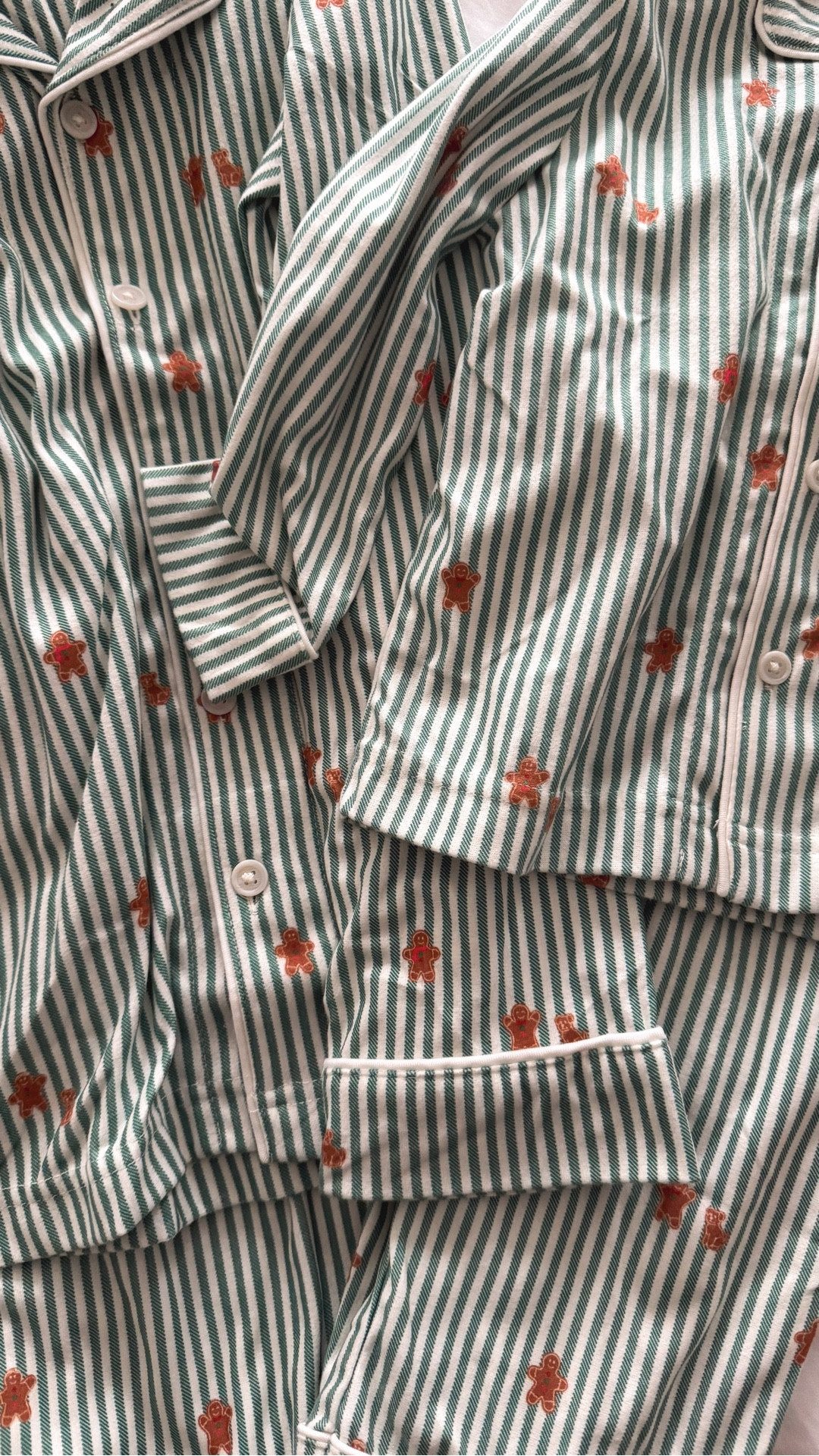 More family-friendly pajamas for the holidays 🌲these pjs are so soft and cozy! A beautiful green pin stripe with little gingerbread men add a touch of holiday spirit. Available in every size! 

#LTKHoliday #LTKFamily #LTKSeasonal