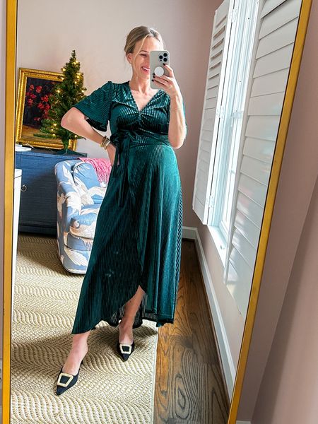 This velvet wrap dress is so pretty and an Amazon find! I have a size 4-6 to accommodate my bump (I’m 7 months pregnant). The jeweled kitten heels are true to size  

#LTKSeasonal #LTKshoecrush #LTKHoliday