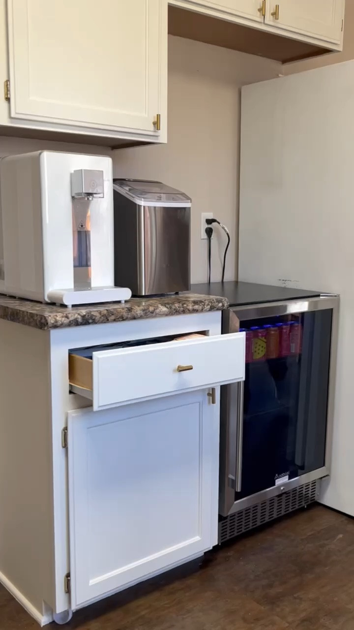 We put this wet bar together over the weekend and I think it turned out so good! This mini fridge is awesome and has lots of features, including a lock (key with kiddos) and holds a lot! Linked all the supplies we used to achieve this look. What do we think? 

#LTKVideo #LTKfamily #LTKhome