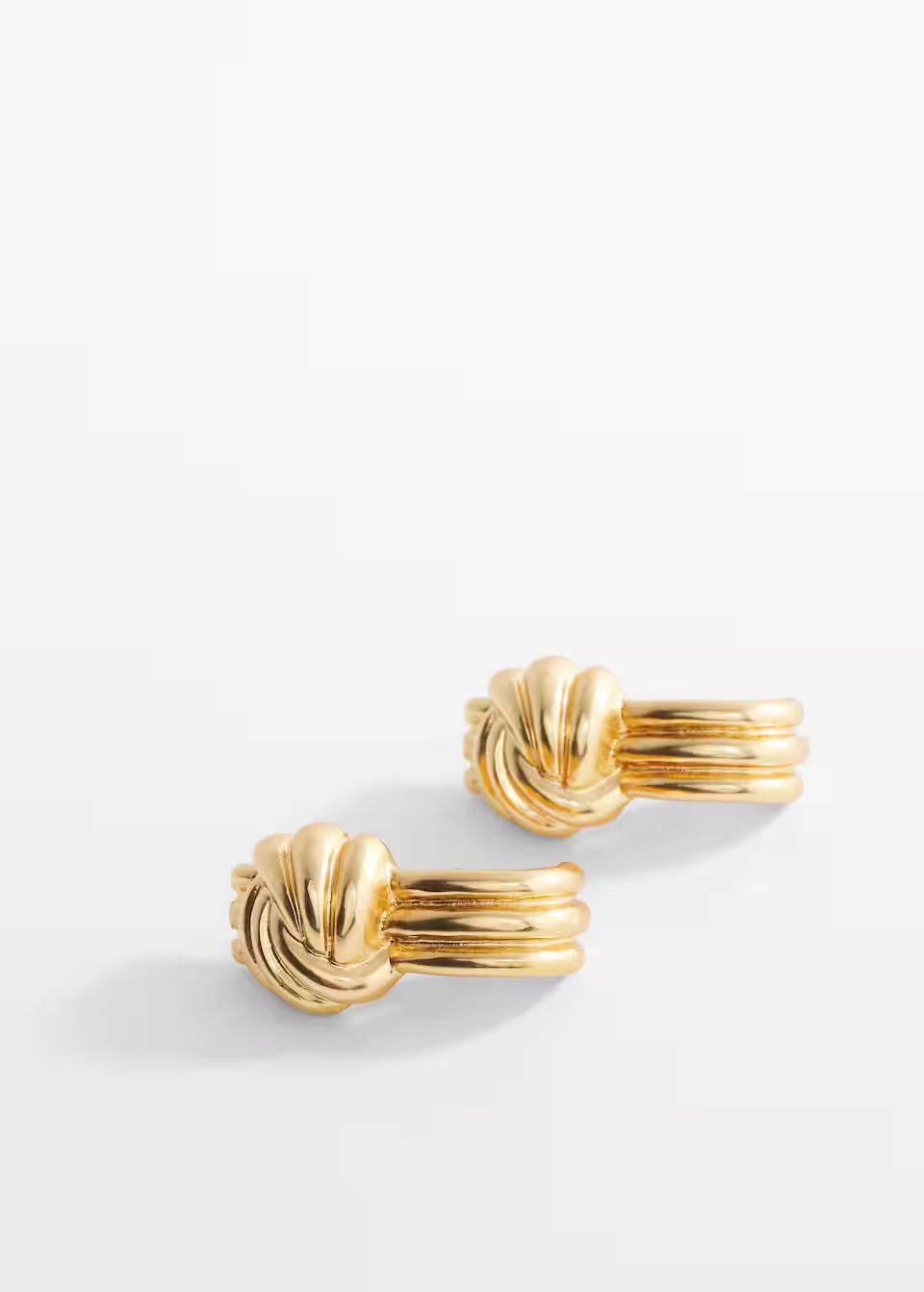 Intertwined design earrings -  Women | Mango USA | MANGO (US)
